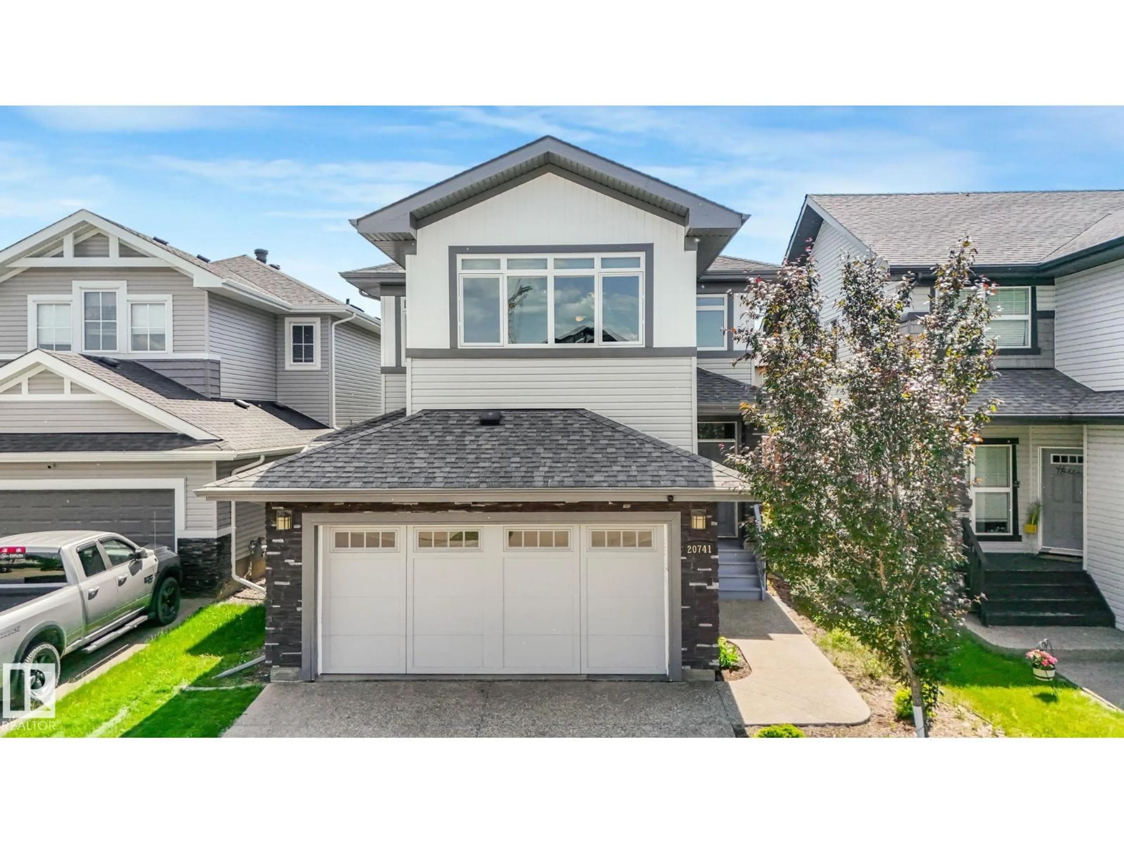 Home with vinyl exterior material, street for 20741 98A AV, Edmonton Alberta T5T7G2