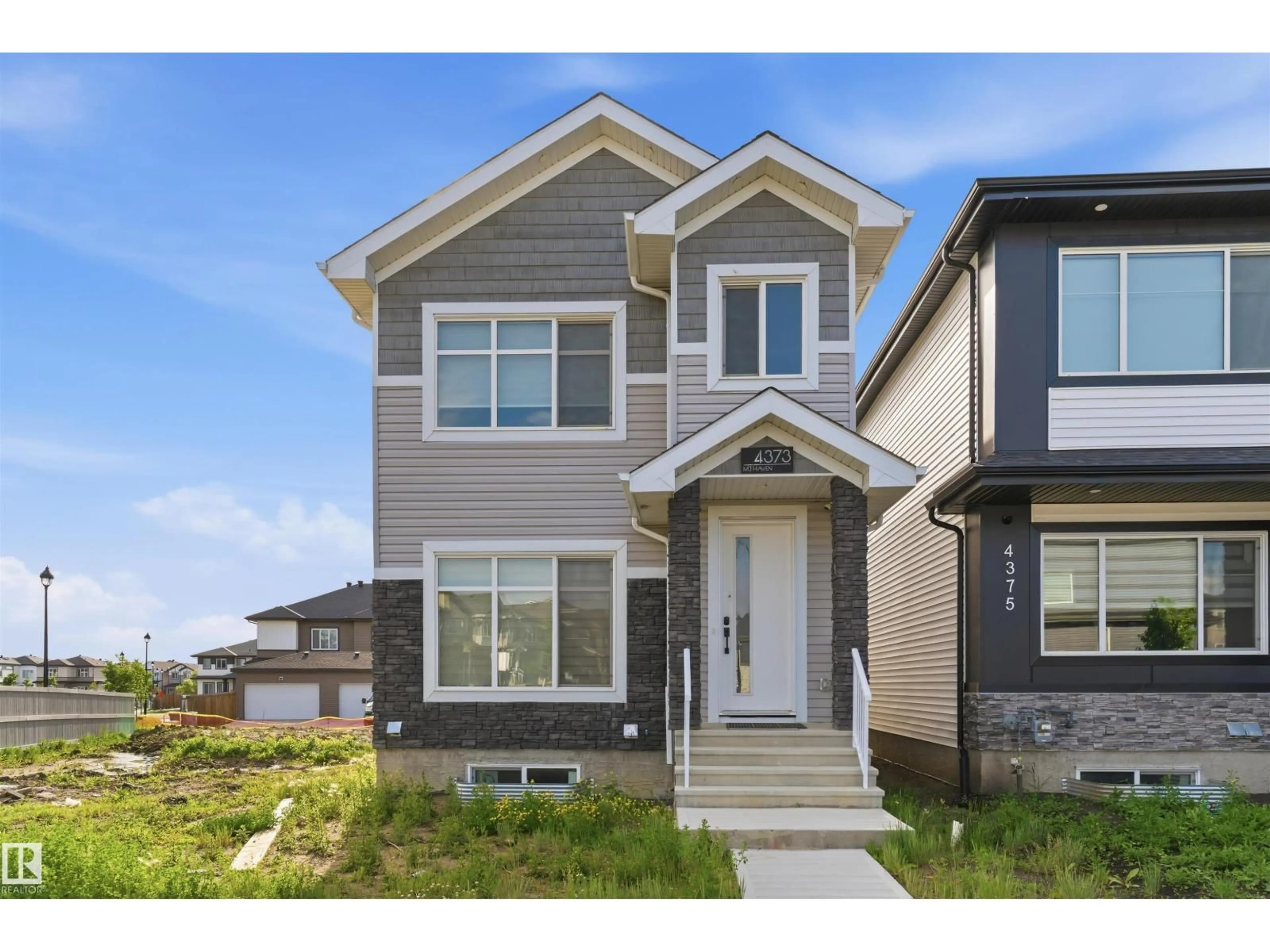 Home with vinyl exterior material, street for 4373 37 ST, Beaumont Alberta T4X3A7