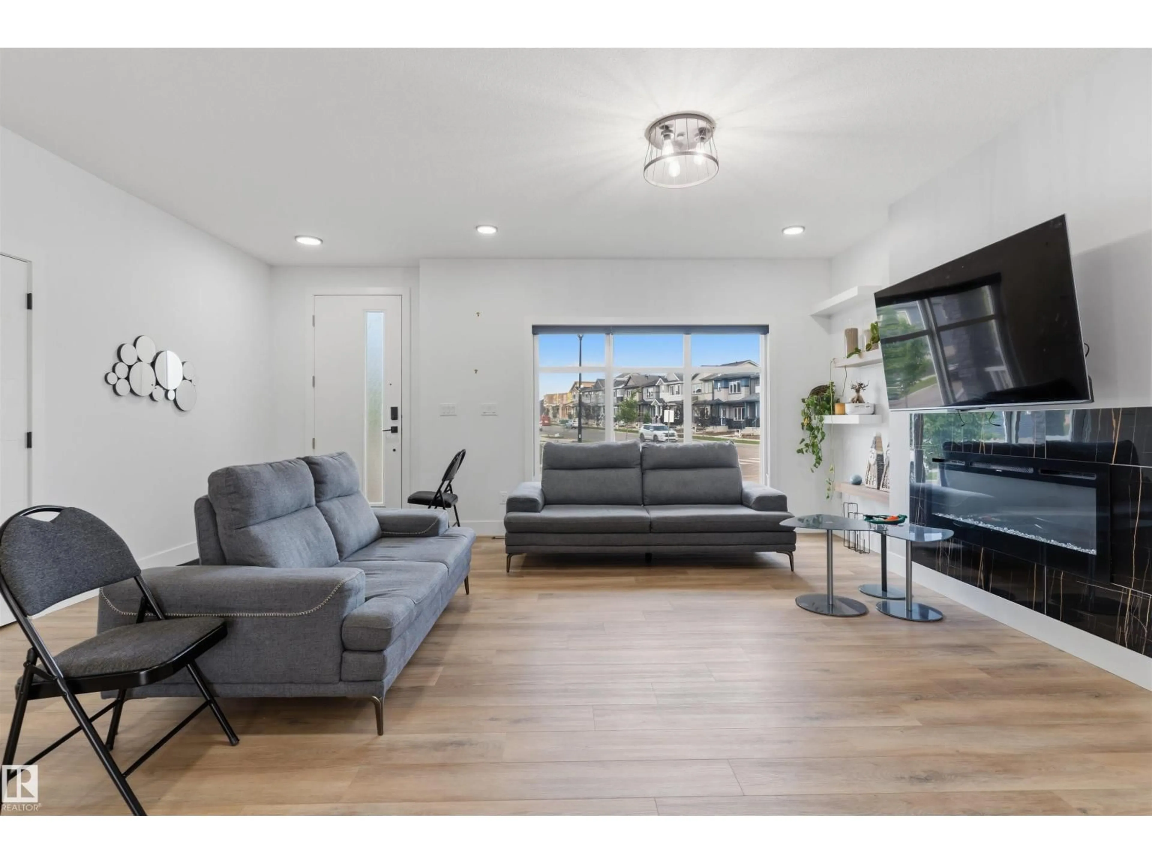 Living room with furniture, unknown for 4373 37 ST, Beaumont Alberta T4X3A7