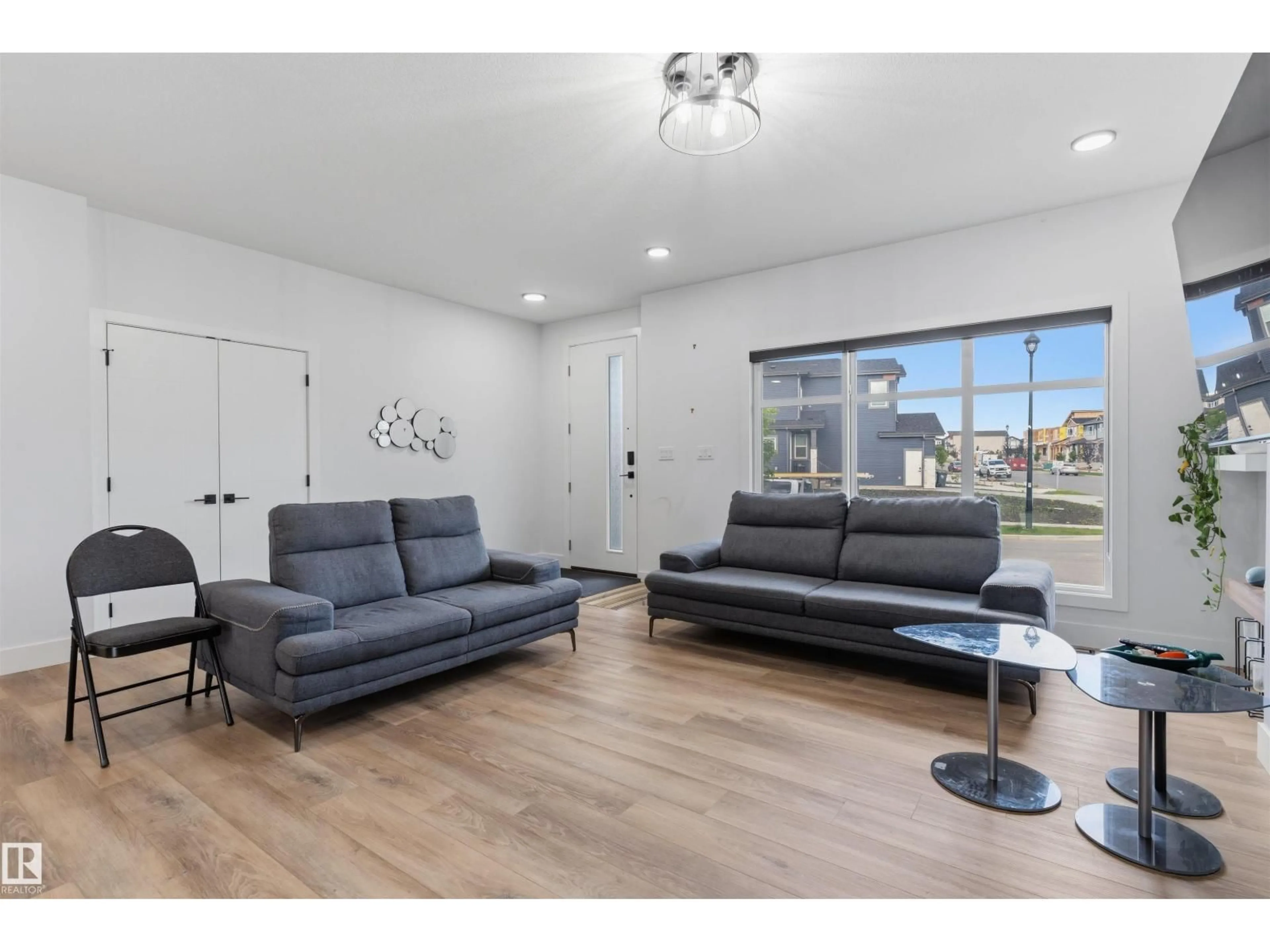 Living room with furniture, unknown for 4373 37 ST, Beaumont Alberta T4X3A7