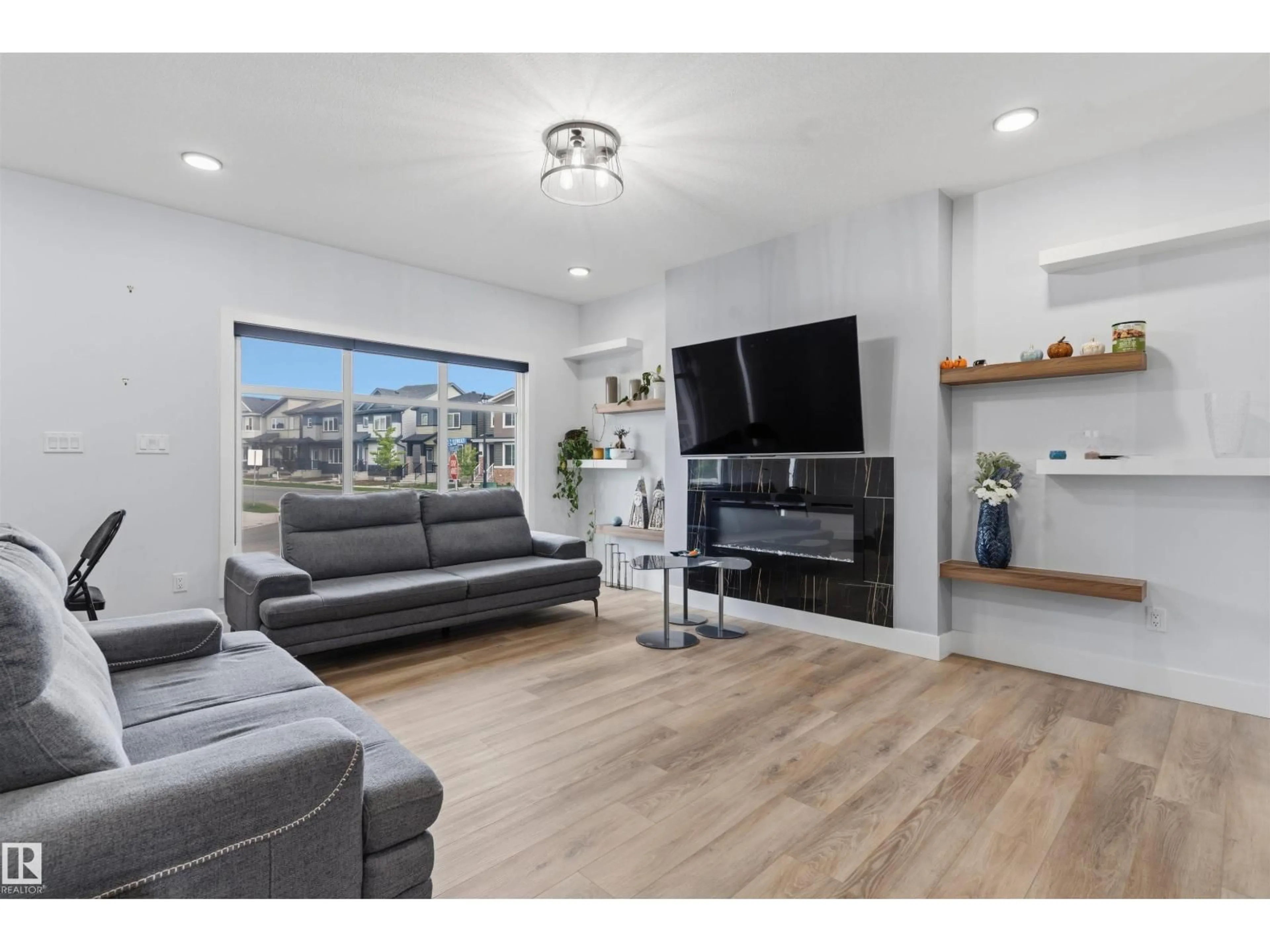 Living room with furniture, unknown for 4373 37 ST, Beaumont Alberta T4X3A7