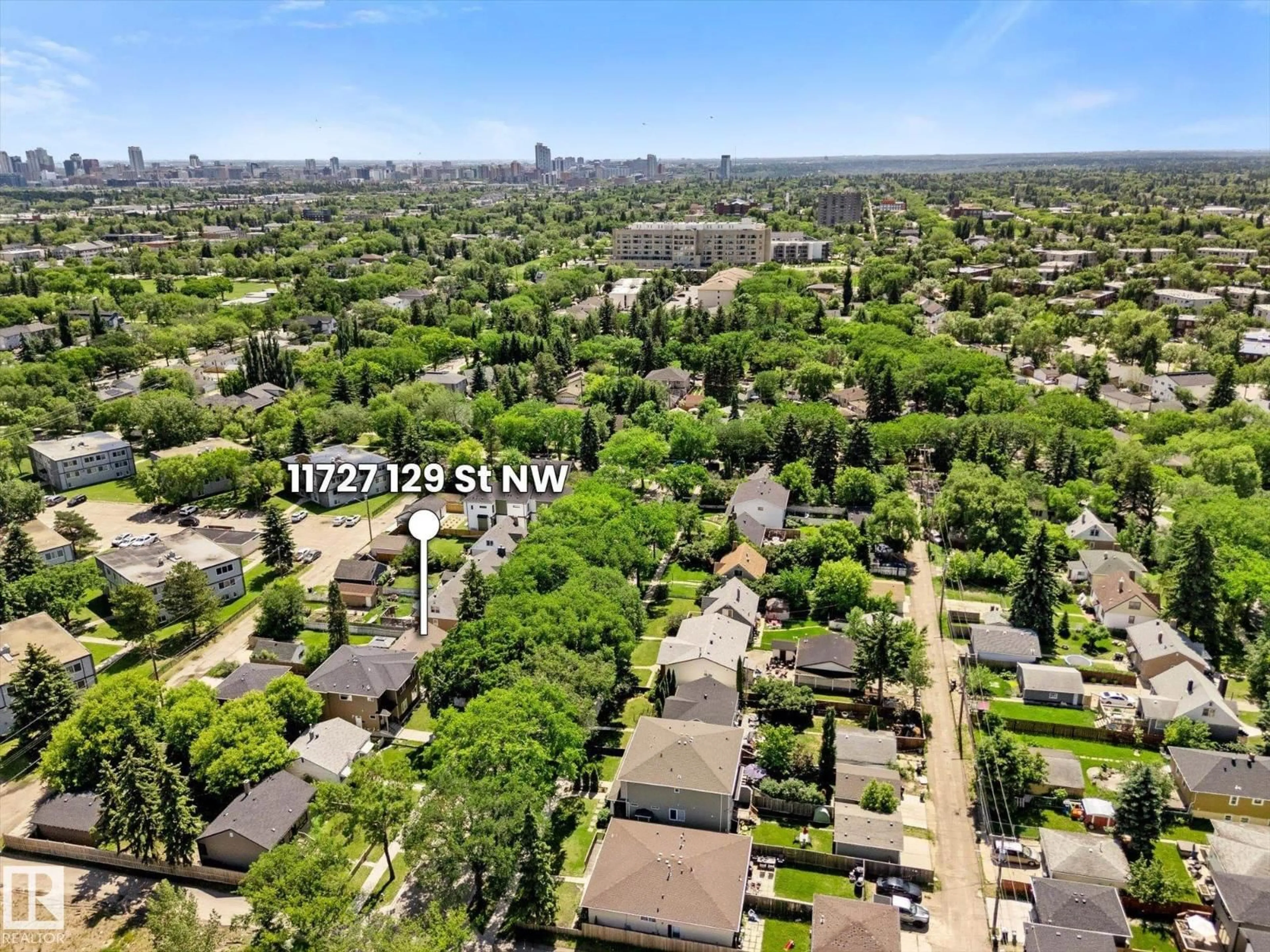 A pic from outside/outdoor area/front of a property/back of a property/a pic from drone, street for 11727 129 ST, Edmonton Alberta T5M0Y8