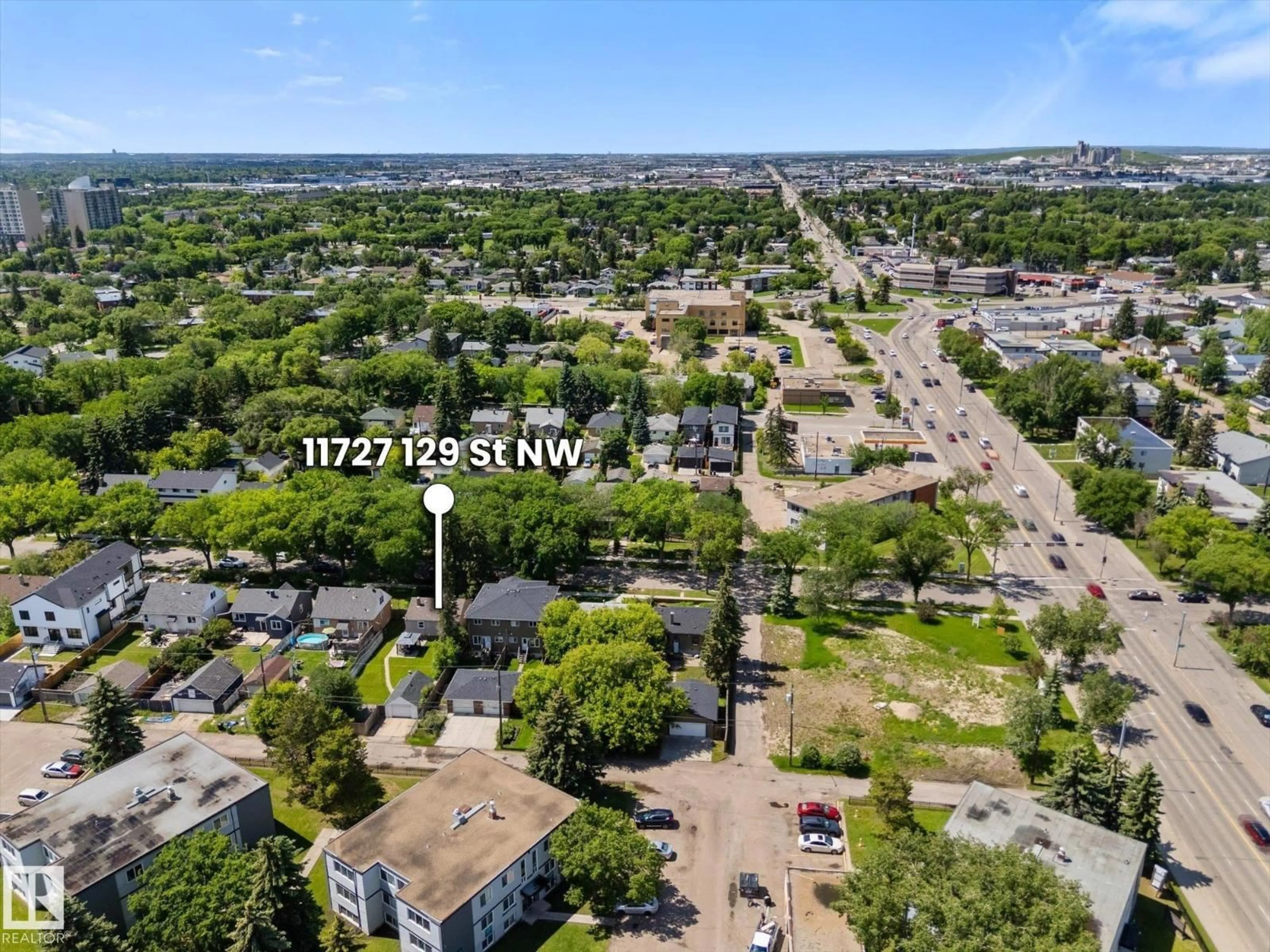 A pic from outside/outdoor area/front of a property/back of a property/a pic from drone, street for 11727 129 ST, Edmonton Alberta T5M0Y8
