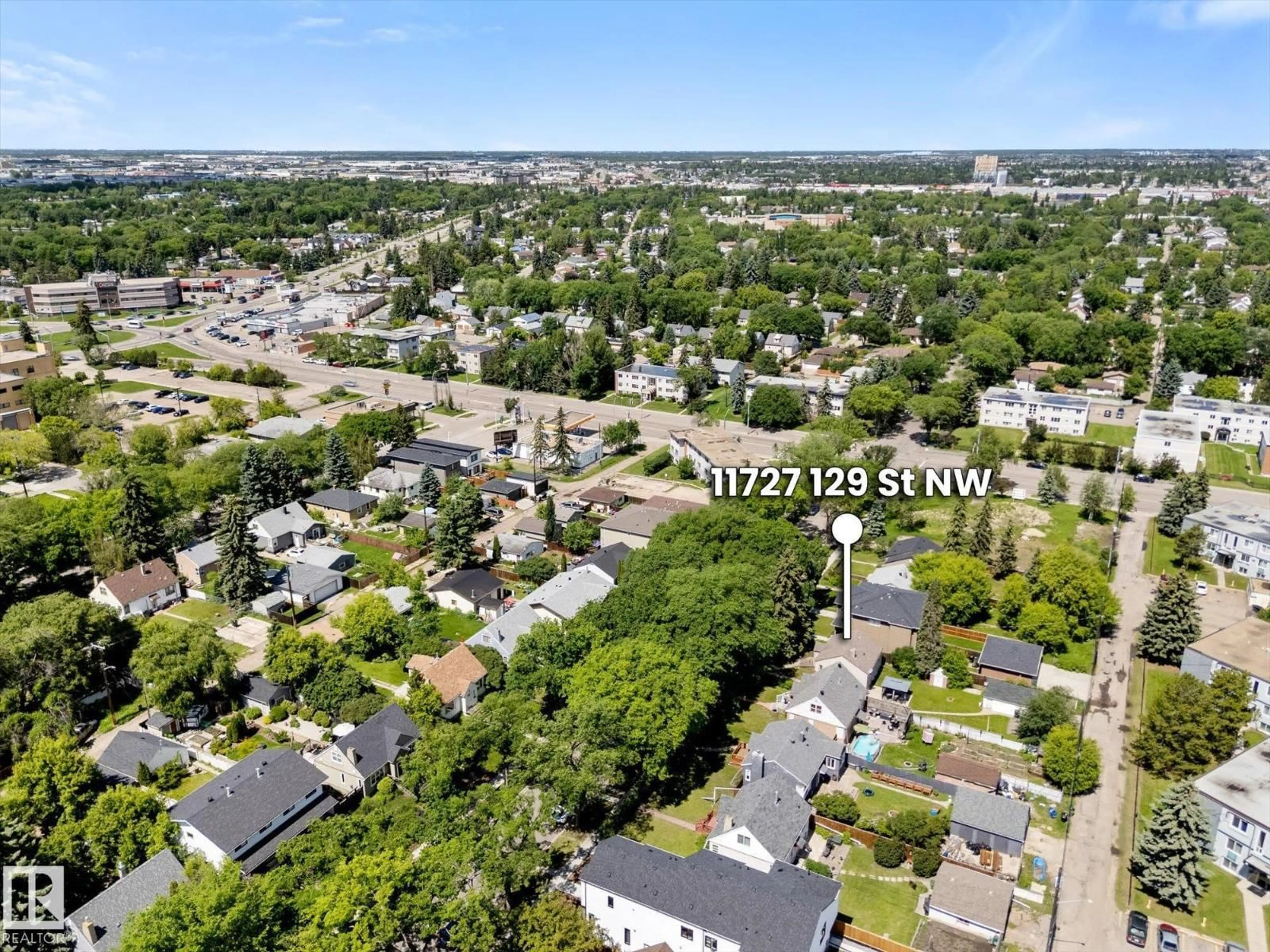 A pic from outside/outdoor area/front of a property/back of a property/a pic from drone, street for 11727 129 ST, Edmonton Alberta T5M0Y8