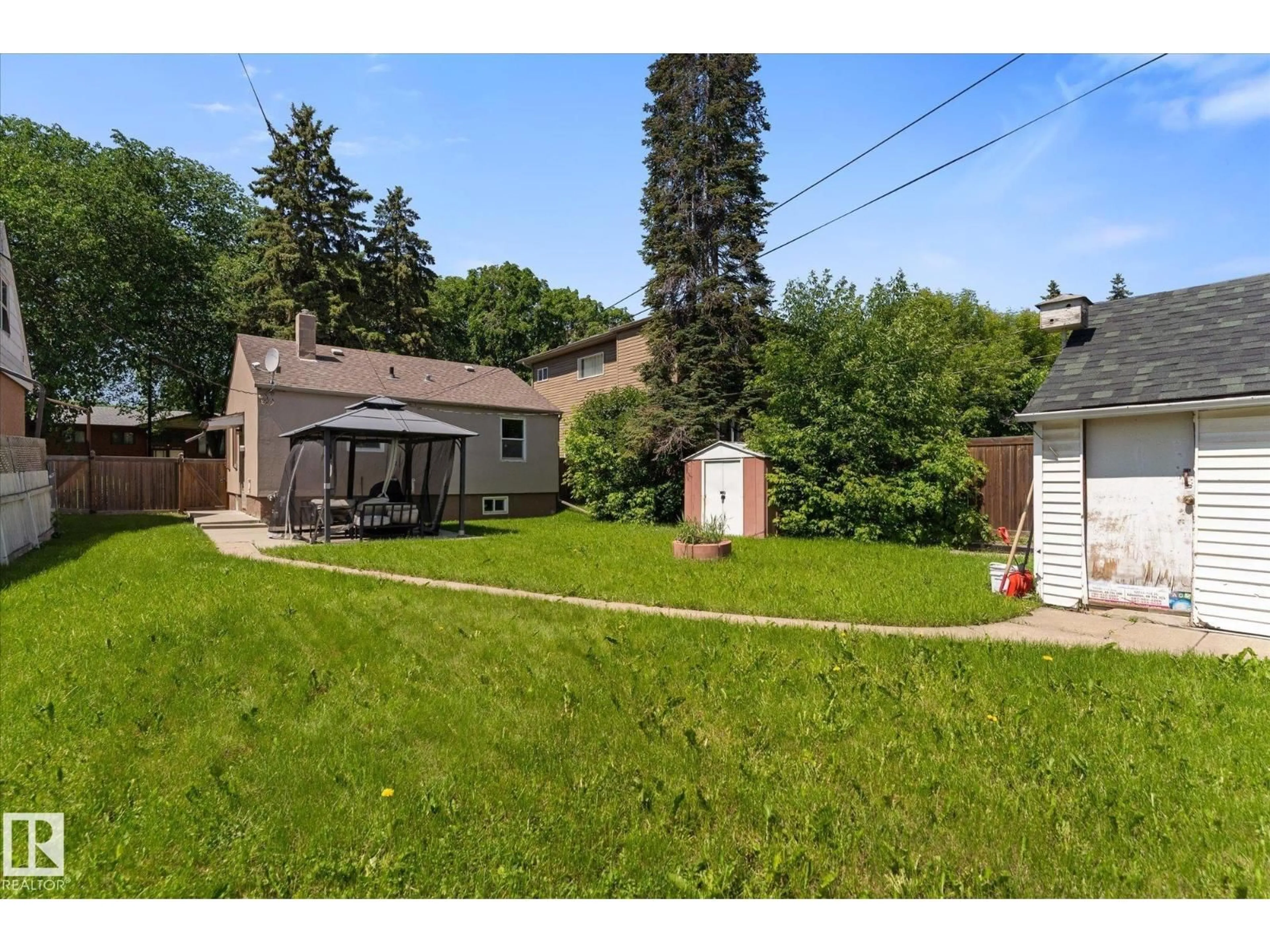 A pic from outside/outdoor area/front of a property/back of a property/a pic from drone, street for 11727 129 ST, Edmonton Alberta T5M0Y8