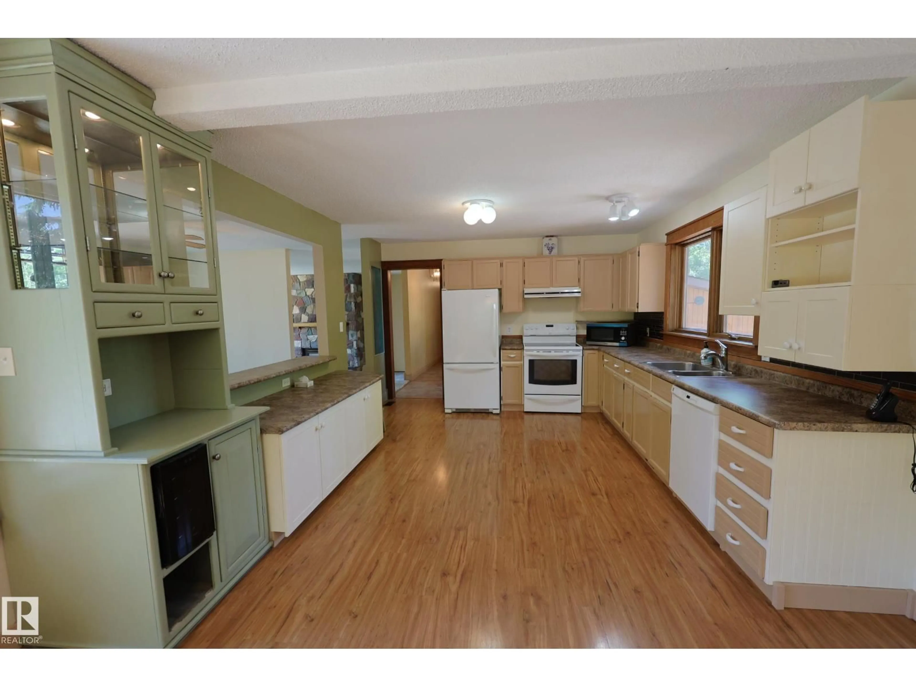 Standard kitchen, wood/laminate floor for #47 - 24213 TWP ROAD 554, Rural Sturgeon County Alberta T0A2N0