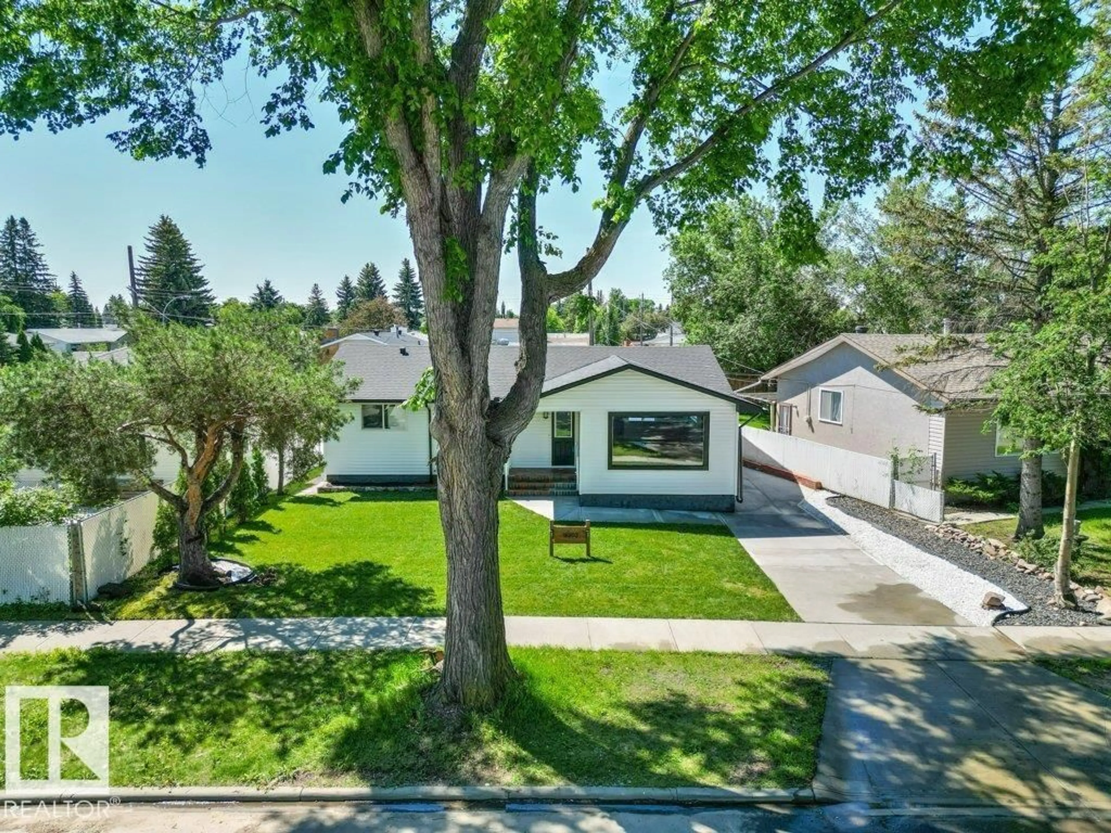 A pic from outside/outdoor area/front of a property/back of a property/a pic from drone, street for 16203 88 AV, Edmonton Alberta T5R4M5