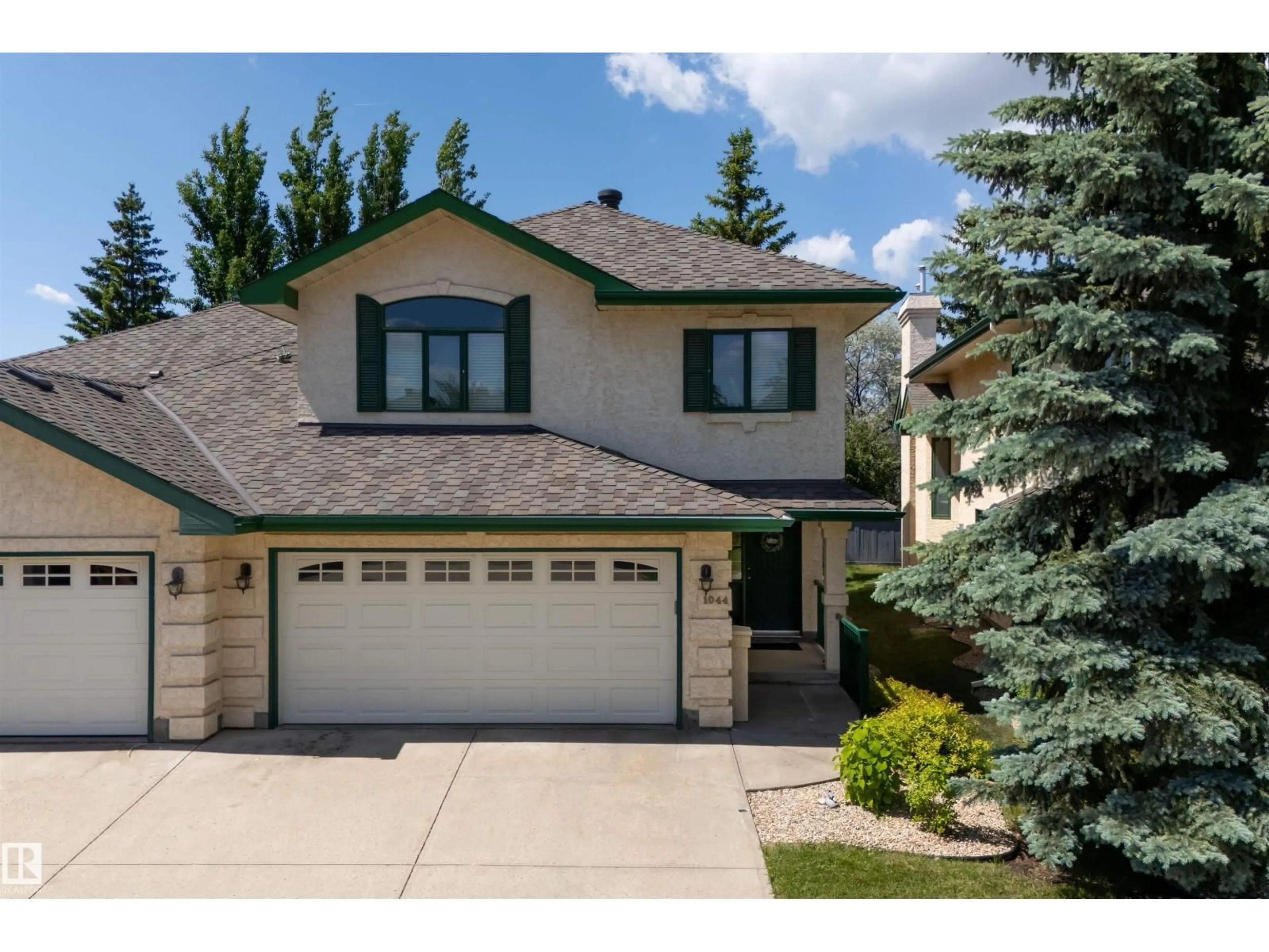 Home with vinyl exterior material, street for 1044 CARTER CREST RD, Edmonton Alberta T6R2K2