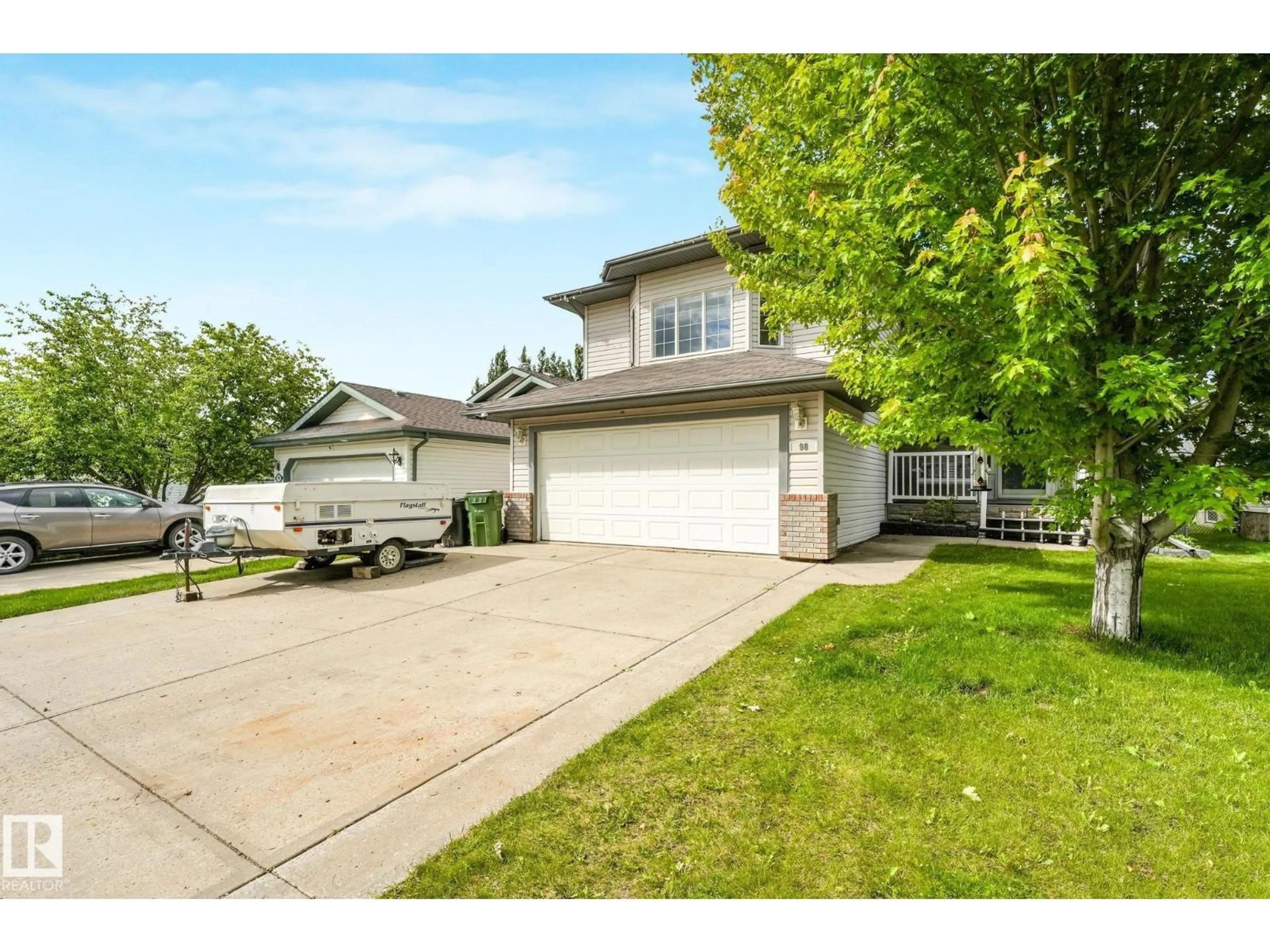 A pic from outside/outdoor area/front of a property/back of a property/a pic from drone, street for 98 BRIDGEPORT WD, Leduc Alberta T9E8B2