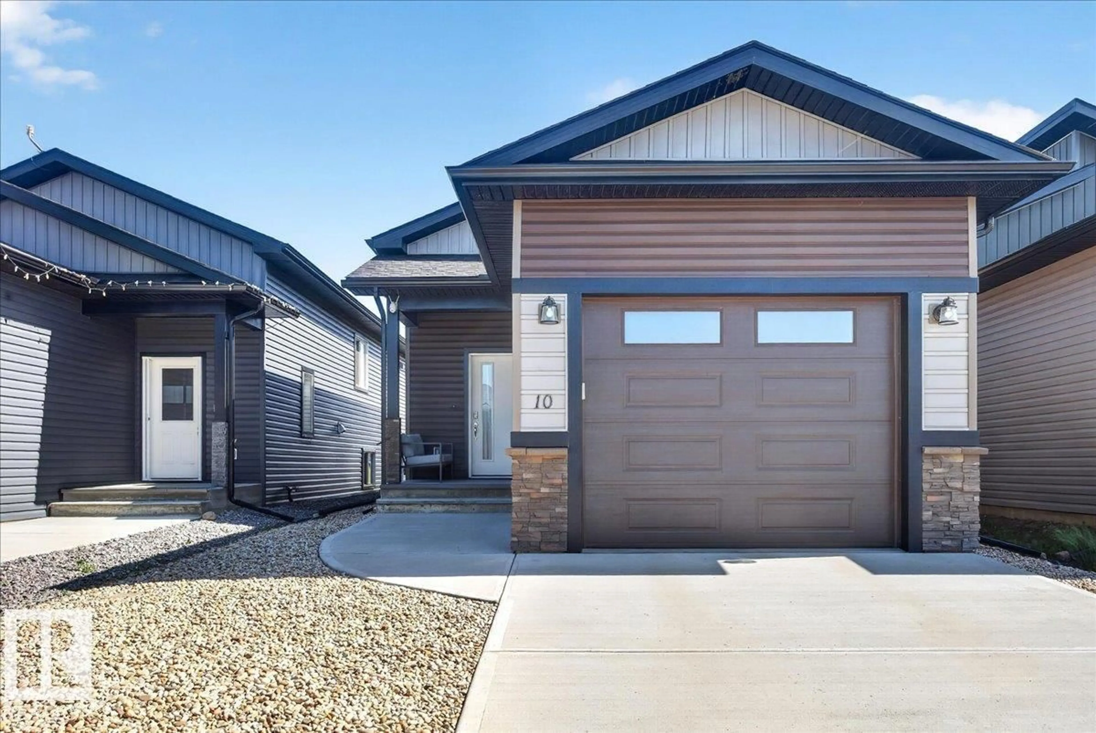 Home with vinyl exterior material, street for 10 WHITETAIL COVE, Mundare Alberta T0B3H0