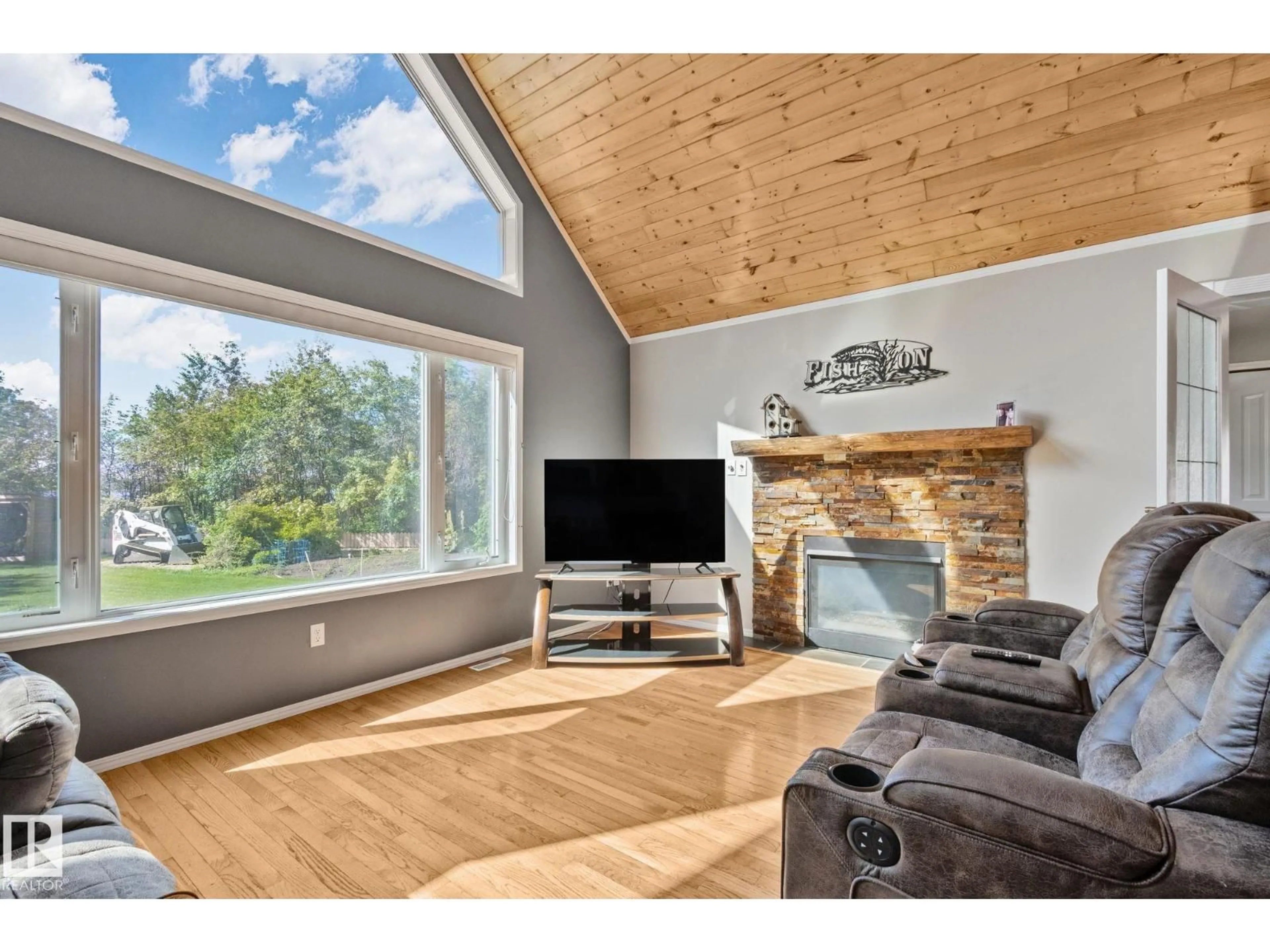 Living room with furniture, wood/laminate floor for 1107 VIEW RD, Rural Barrhead County Alberta T0E1A0