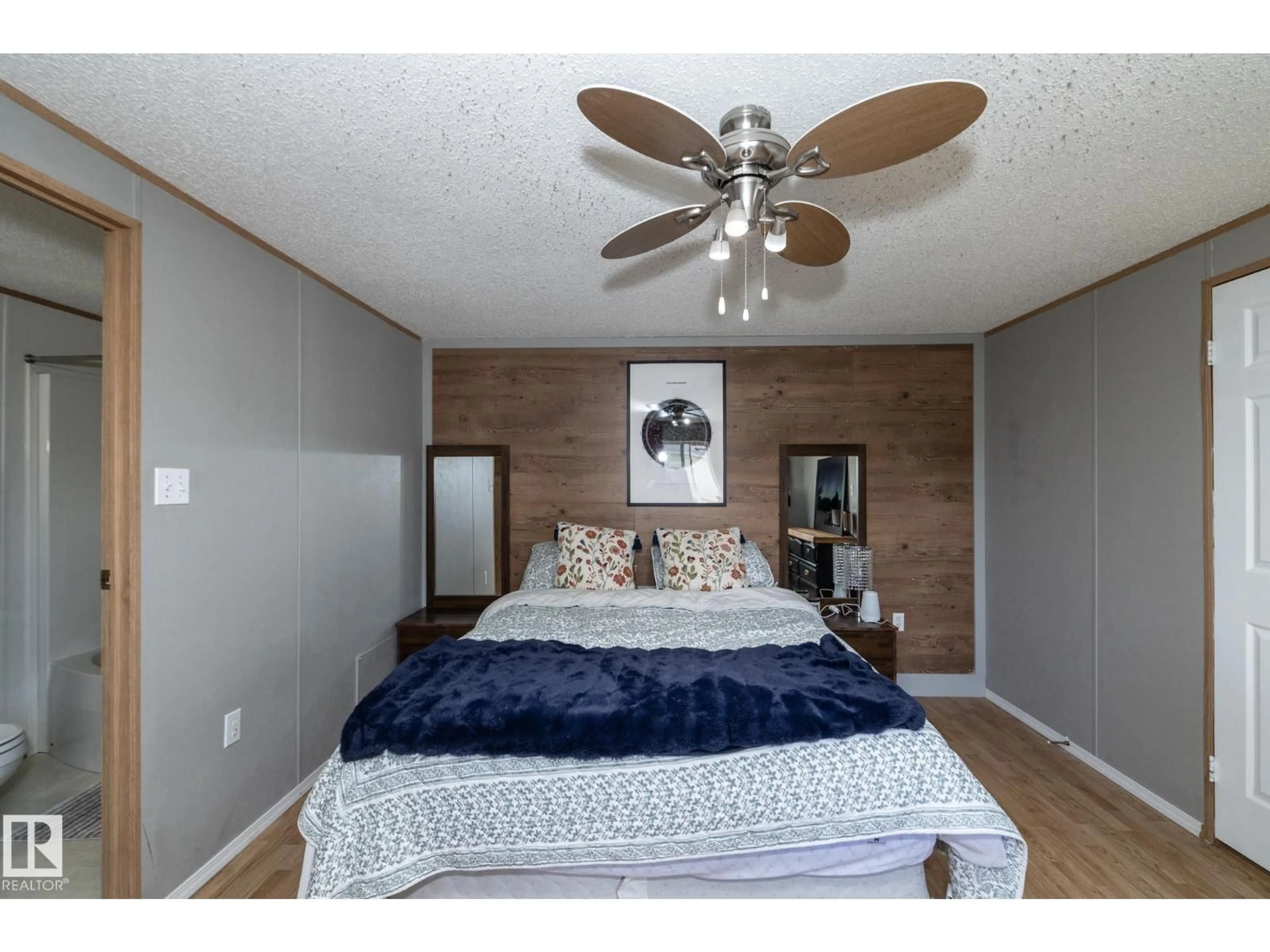 Bedroom with bed, wood/laminate floor for W - 143 48 3400 ST, Stony Plain Alberta T7Z1V9