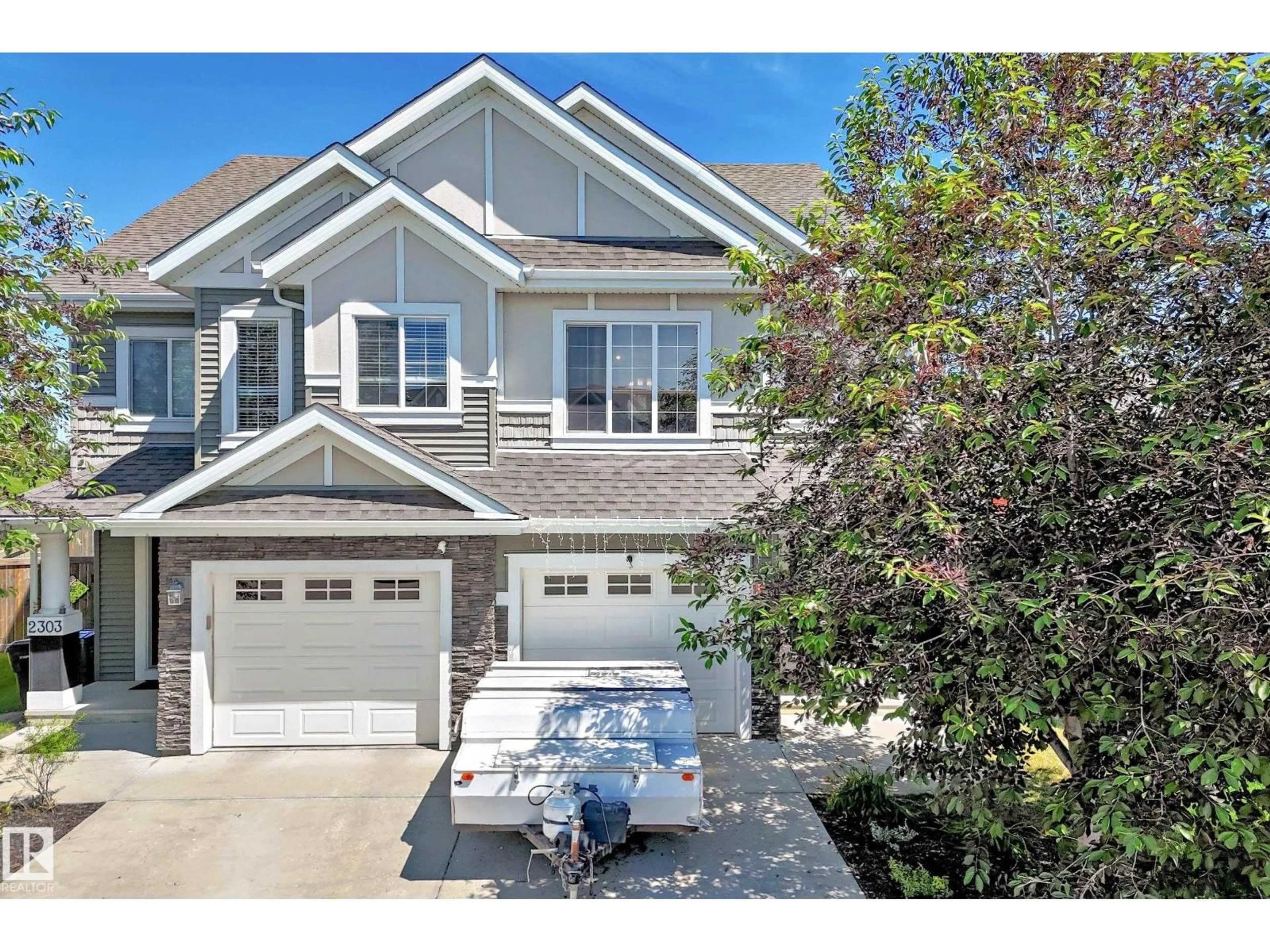 Home with vinyl exterior material, street for 2305 68 ST, Edmonton Alberta T6X2B1
