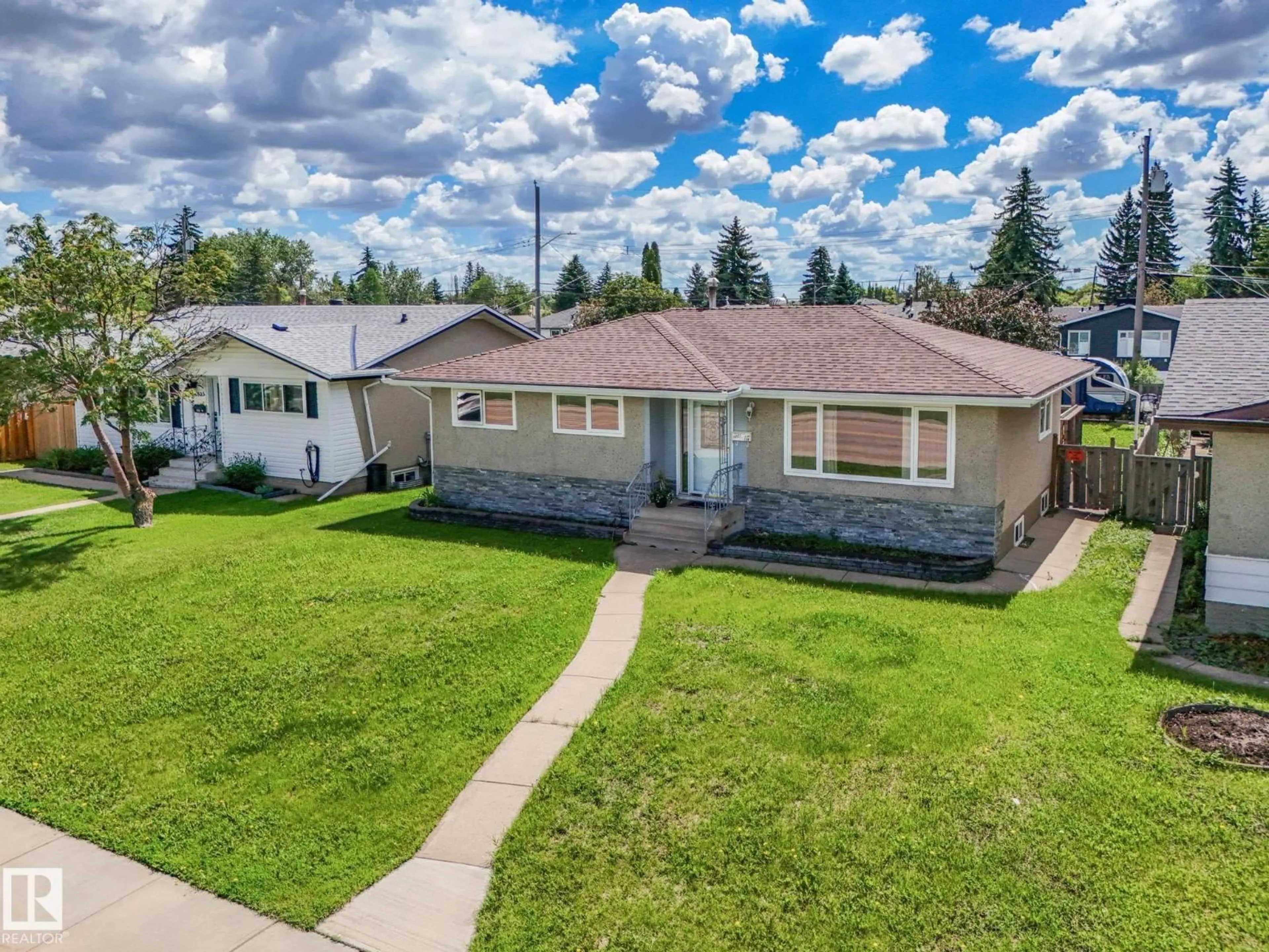 A pic from outside/outdoor area/front of a property/back of a property/a pic from drone, street for 10527 134A AV, Edmonton Alberta T5E1M1
