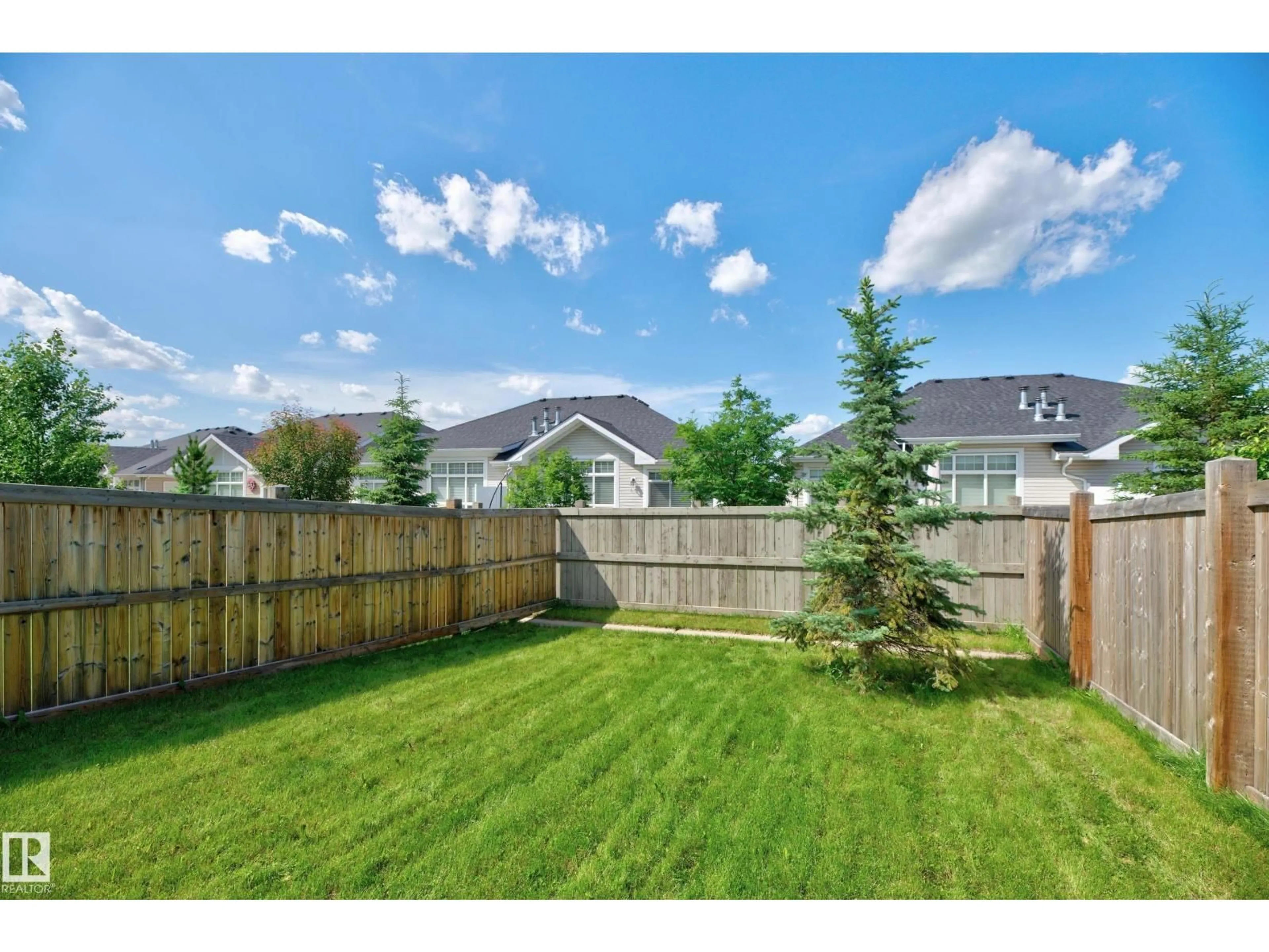 A pic from outside/outdoor area/front of a property/back of a property/a pic from drone, mountain view for 71 AVEBURY, Sherwood Park Alberta T8H0Z3