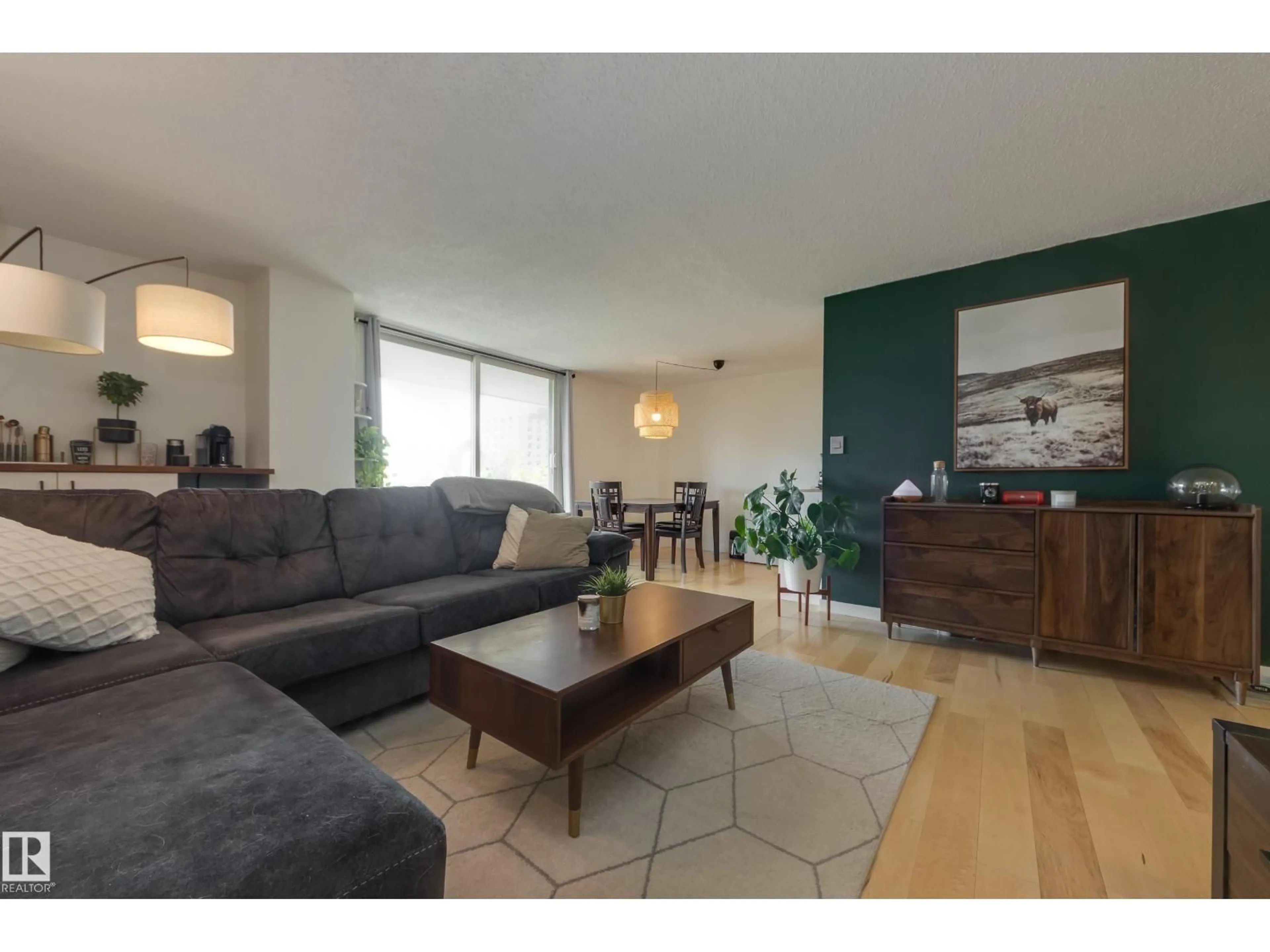 Living room with furniture, wood/laminate floor for #504 - 9909 110 ST, Edmonton Alberta T5K2E5