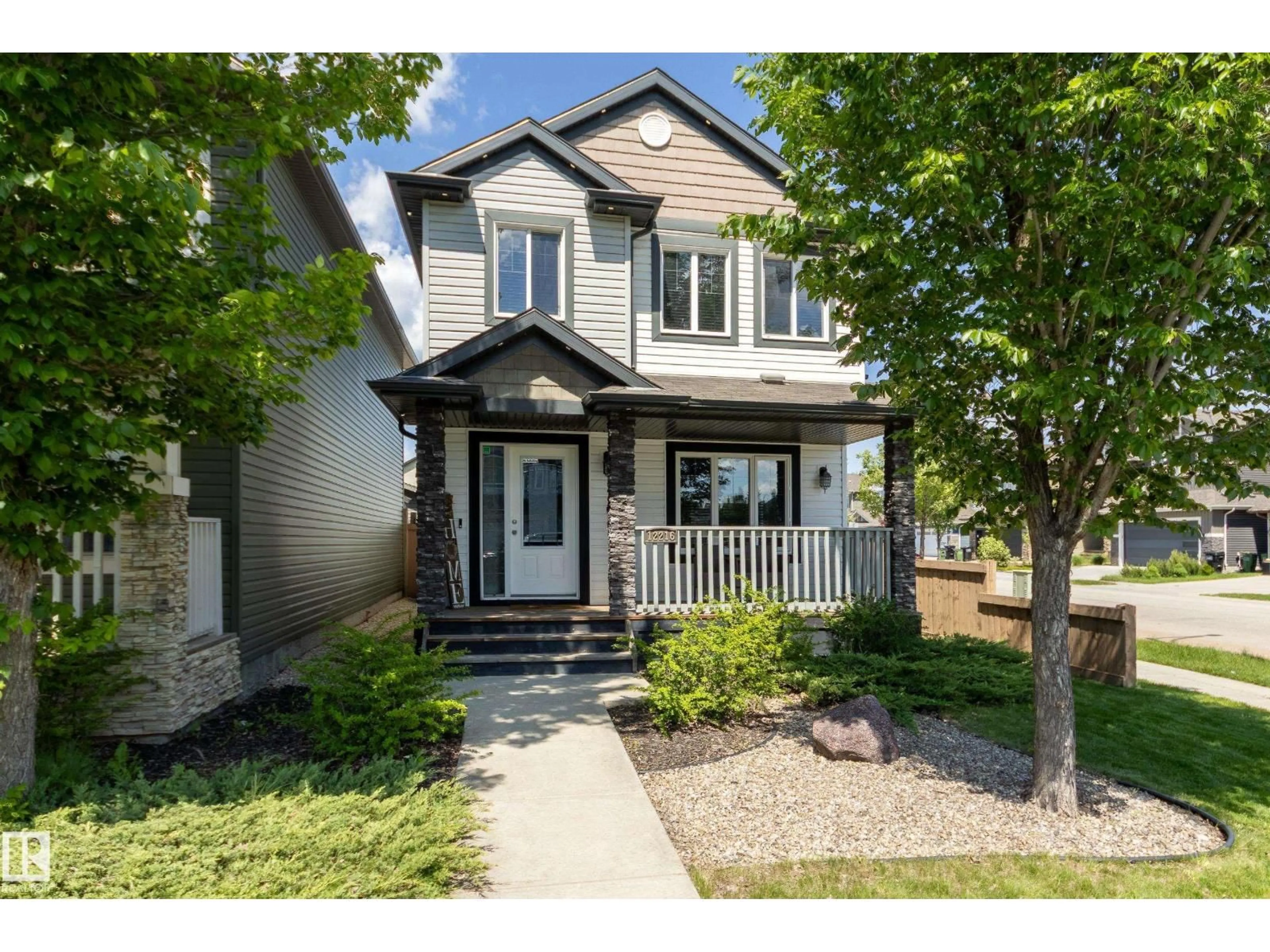 Home with vinyl exterior material, street for 12216 173 AV, Edmonton Alberta T5X0K2