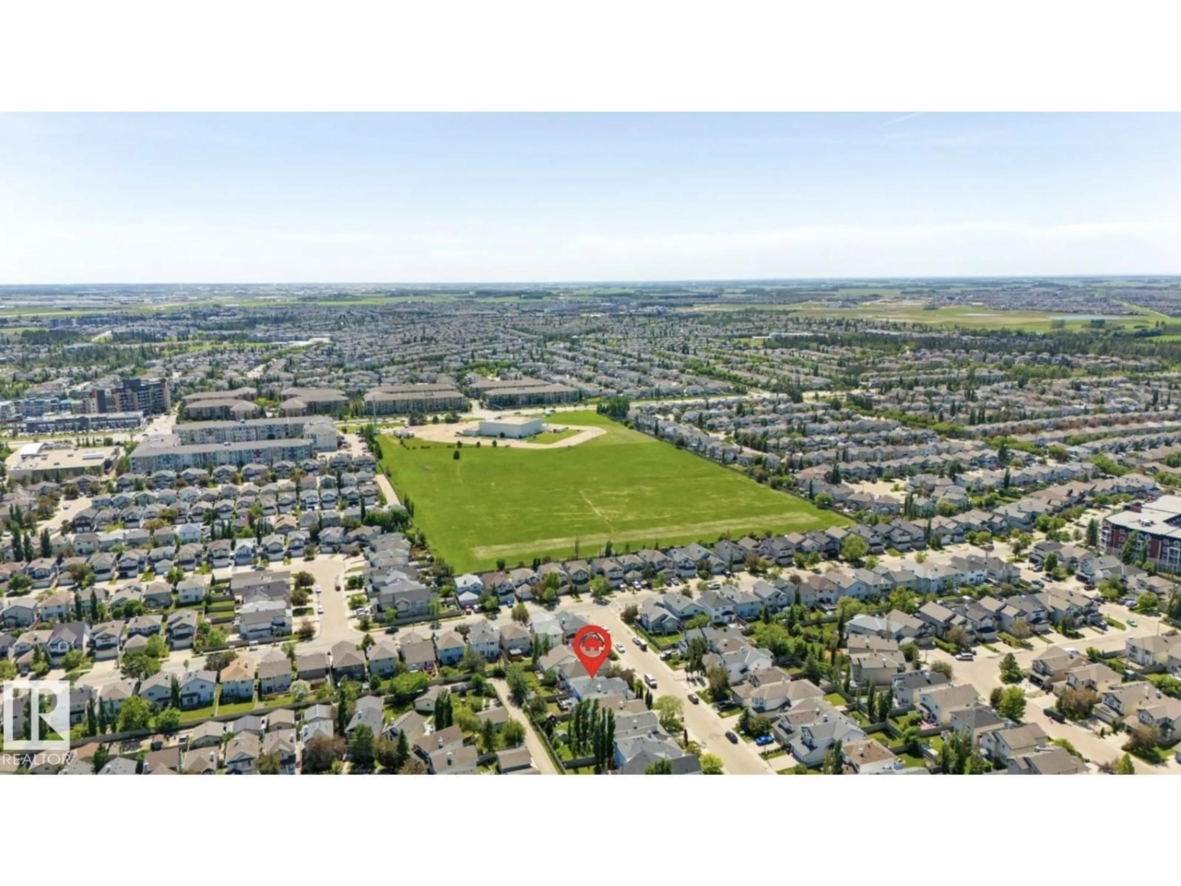 A pic from outside/outdoor area/front of a property/back of a property/a pic from drone, mountain view for 1007 MACEWAN CL, Edmonton Alberta T6W1K2