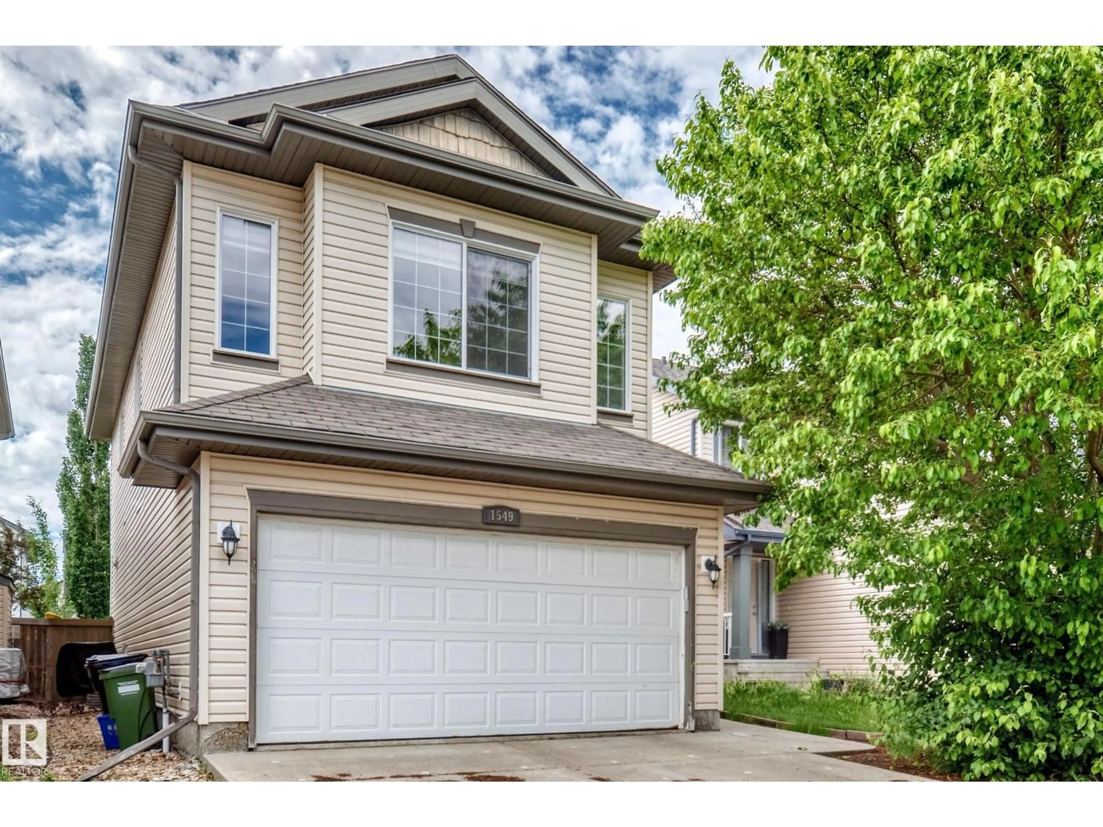 Home with vinyl exterior material, street for 1549 37C AV, Edmonton Alberta T6T0E1