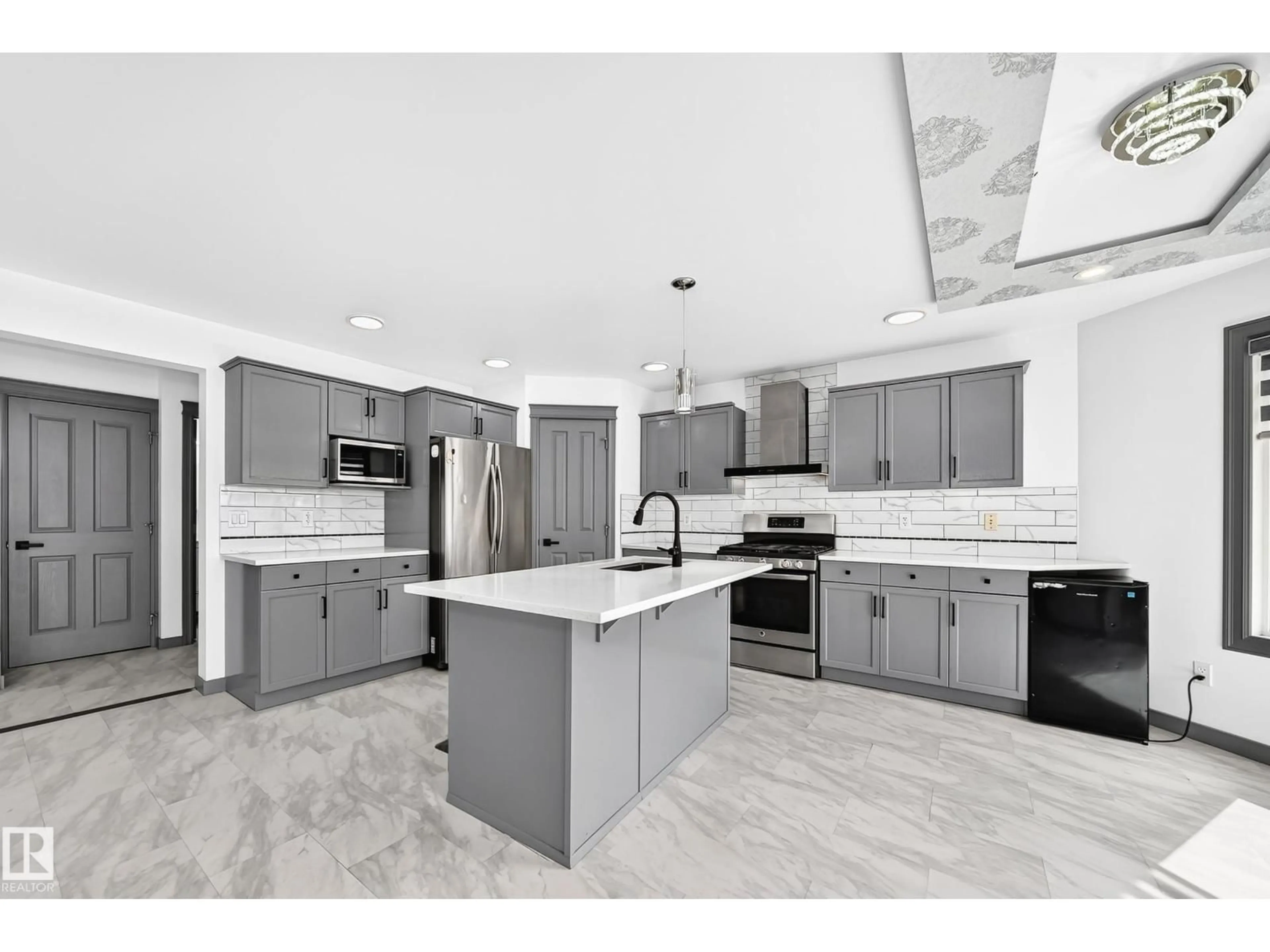 Open concept kitchen, ceramic/tile floor for 1549 37C AV, Edmonton Alberta T6T0E1