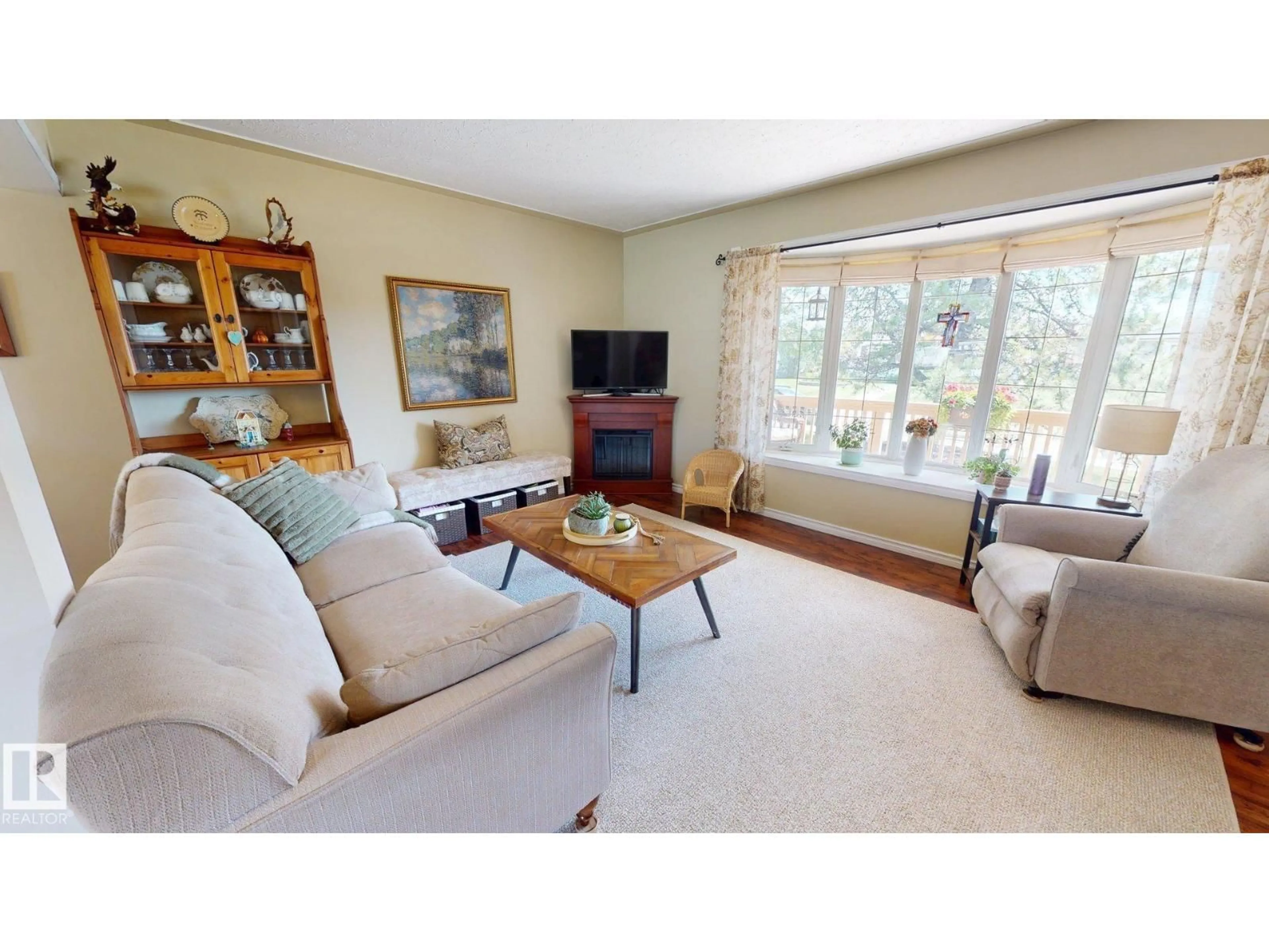 Living room with furniture, unknown for 5304 95 AV NW, Edmonton Alberta T6B1A3