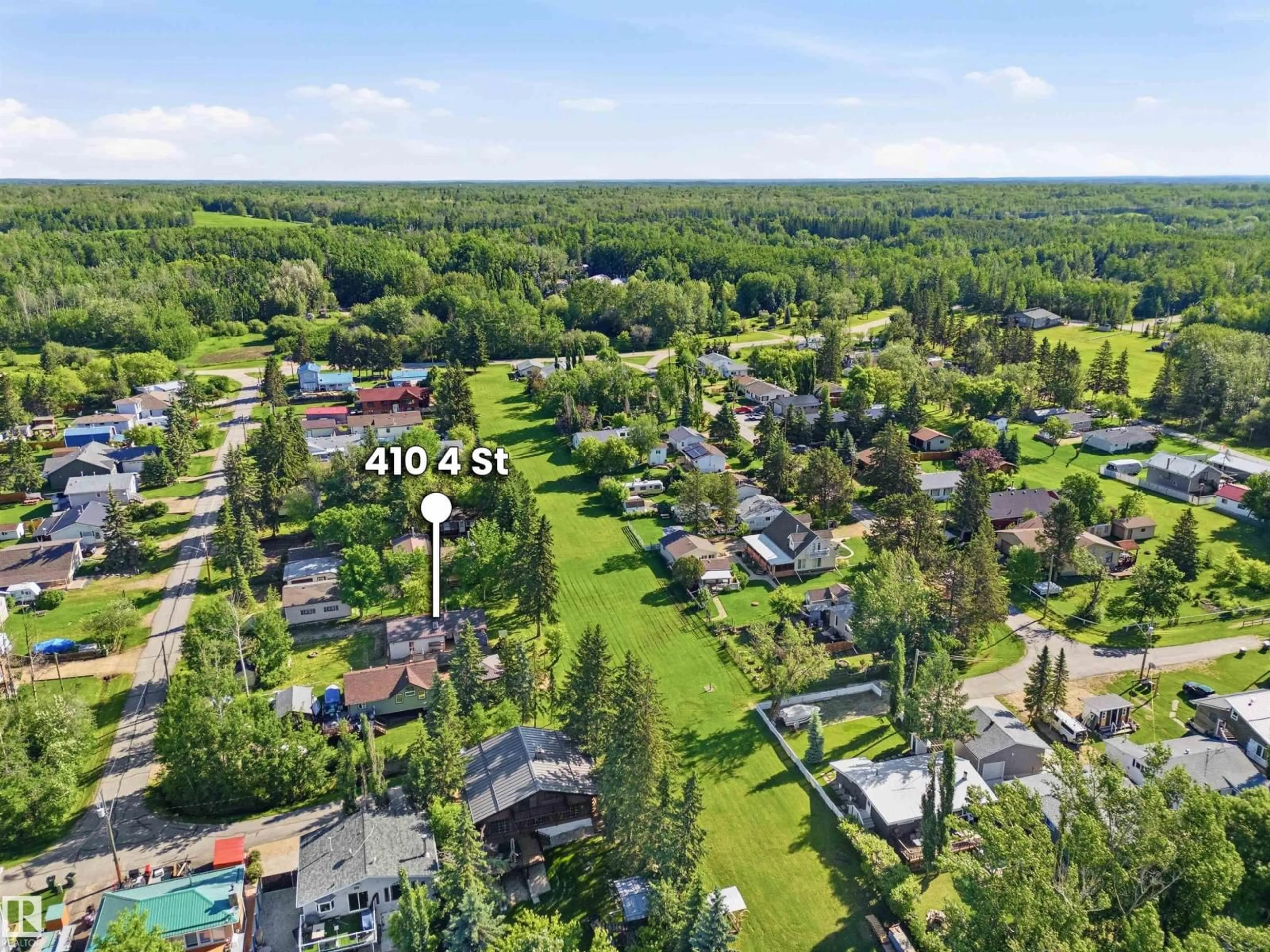 A pic from outside/outdoor area/front of a property/back of a property/a pic from drone, forest/trees view for 410 4 ST, Rural Lac Ste. Anne County Alberta T0E1A0