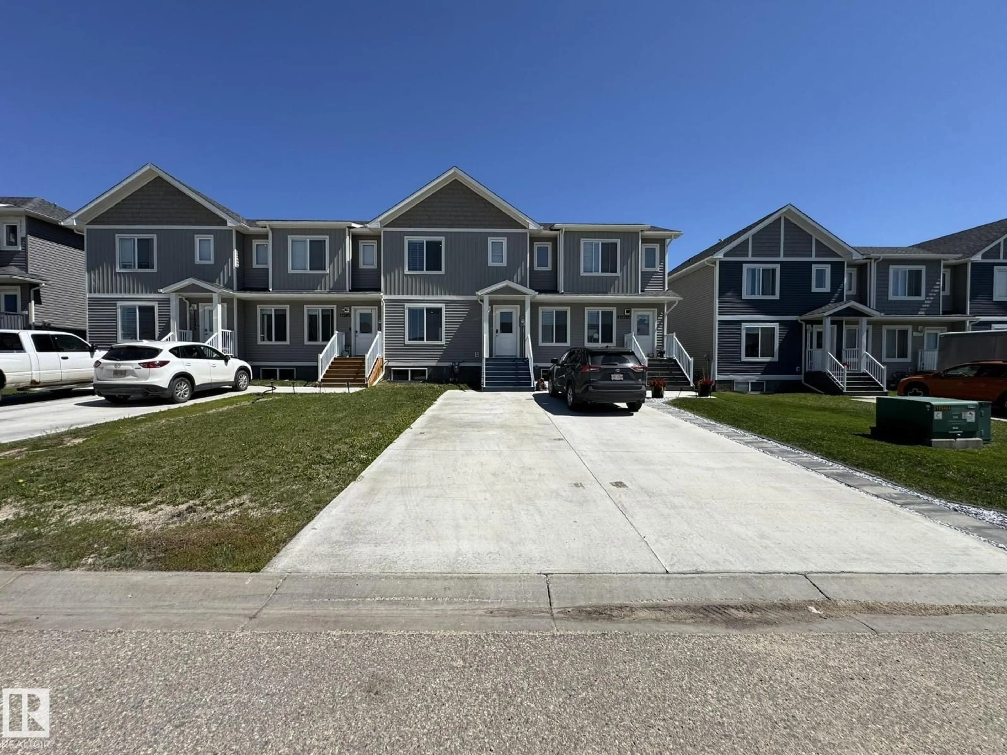 A pic from outside/outdoor area/front of a property/back of a property/a pic from drone, street for B - 11205 95 STREET, Clairmont Alberta T8X5C8