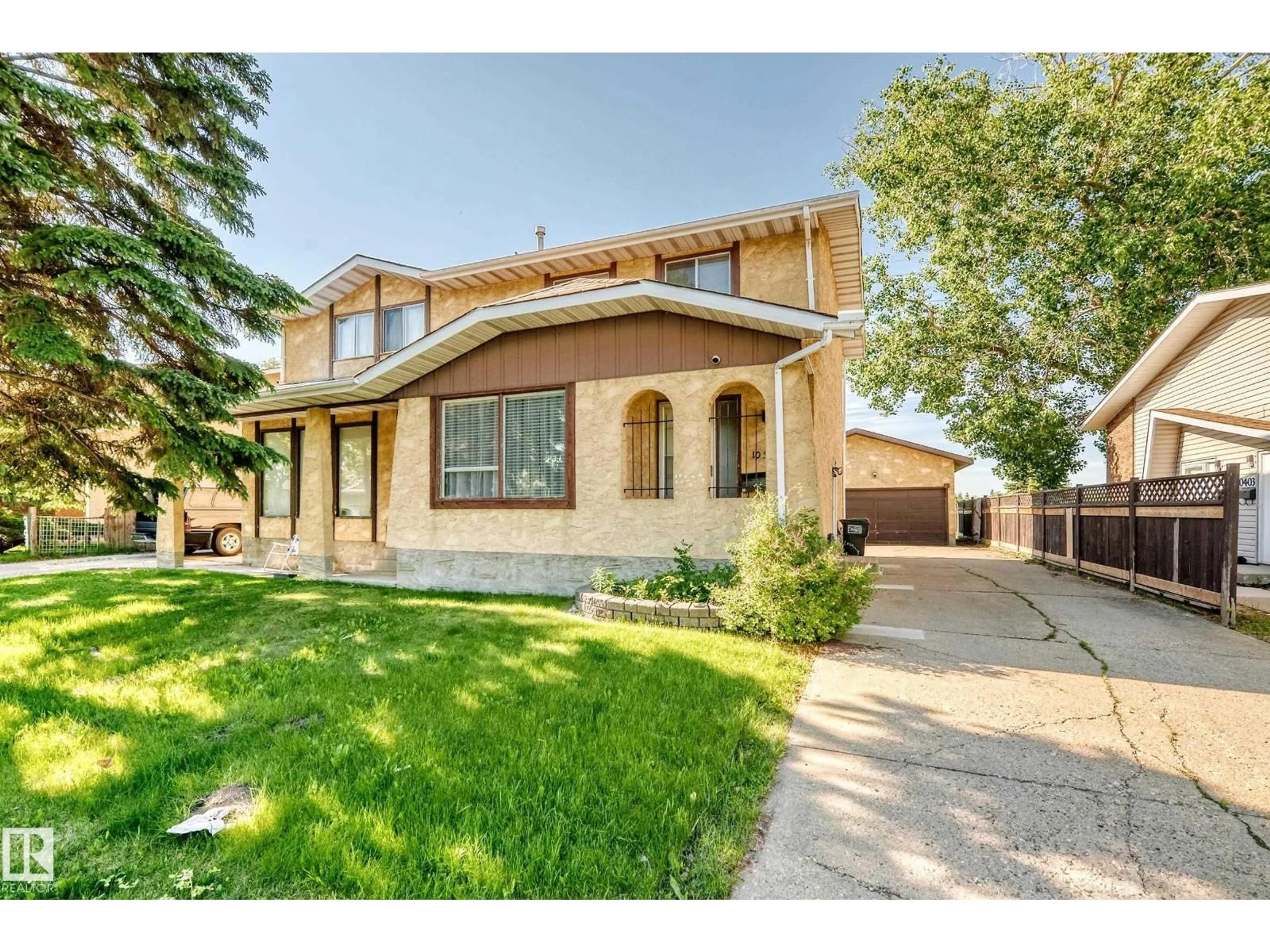 Home with brick exterior material, street for 10325 164 AV, Edmonton Alberta T5X2J2