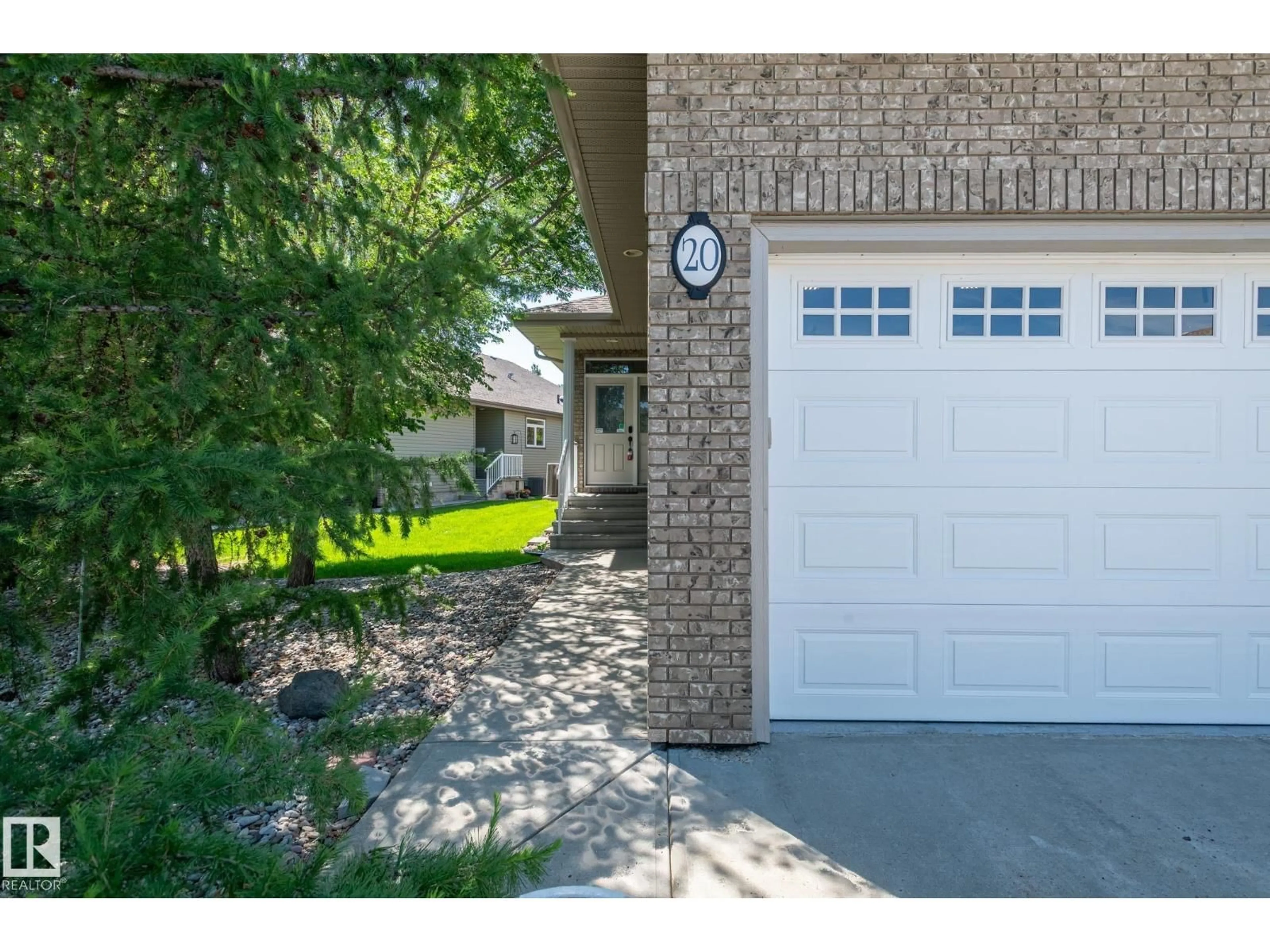 Home with brick exterior material, street for 1407 - 20 GLASTONBURY BV, Edmonton Alberta T5T3W3