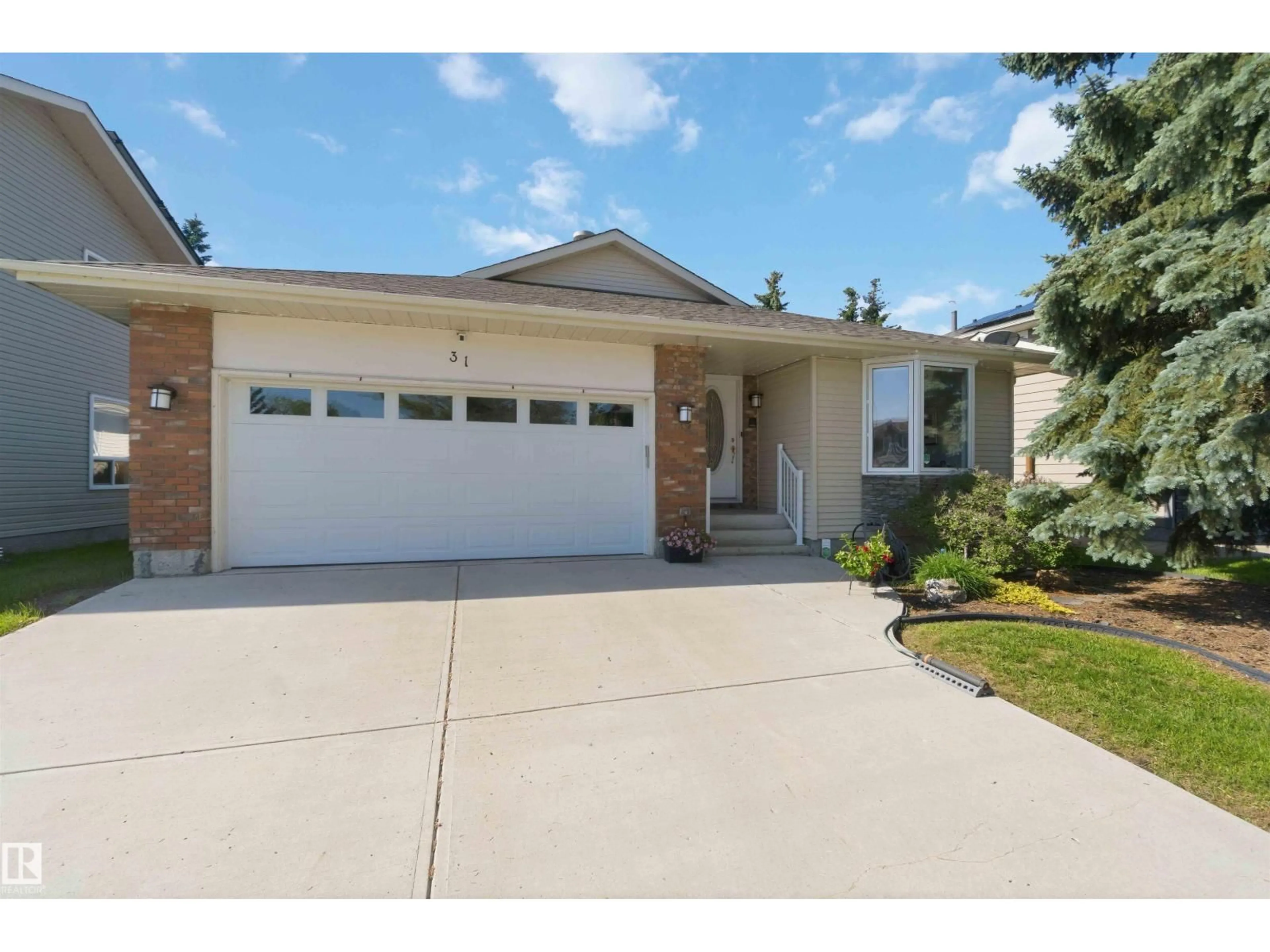Home with vinyl exterior material, street for 31 GARIEPY CR, Edmonton Alberta T6M1B5