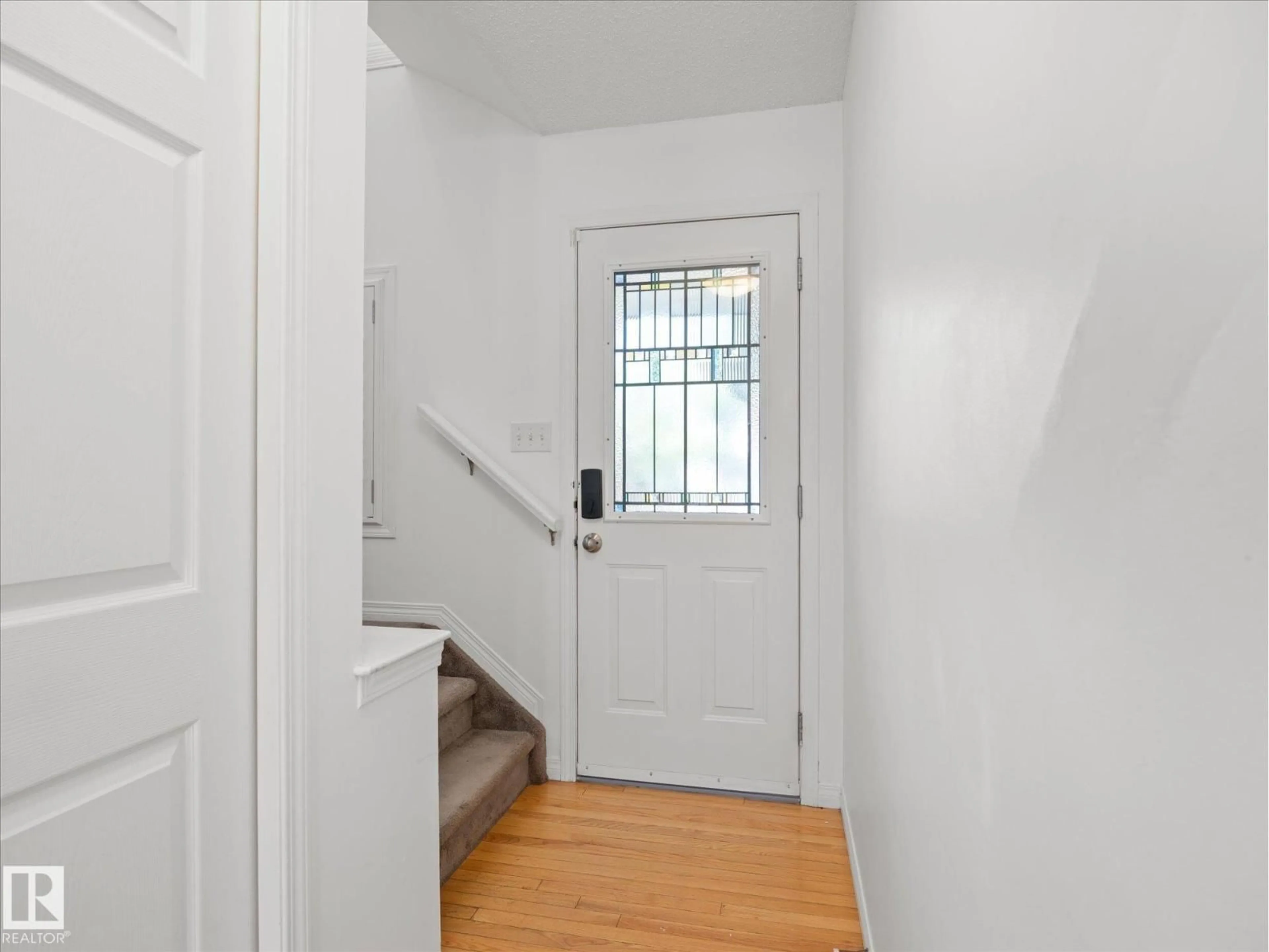 Indoor entryway for SW - 12126 16 AV, Edmonton Alberta T6W1L9