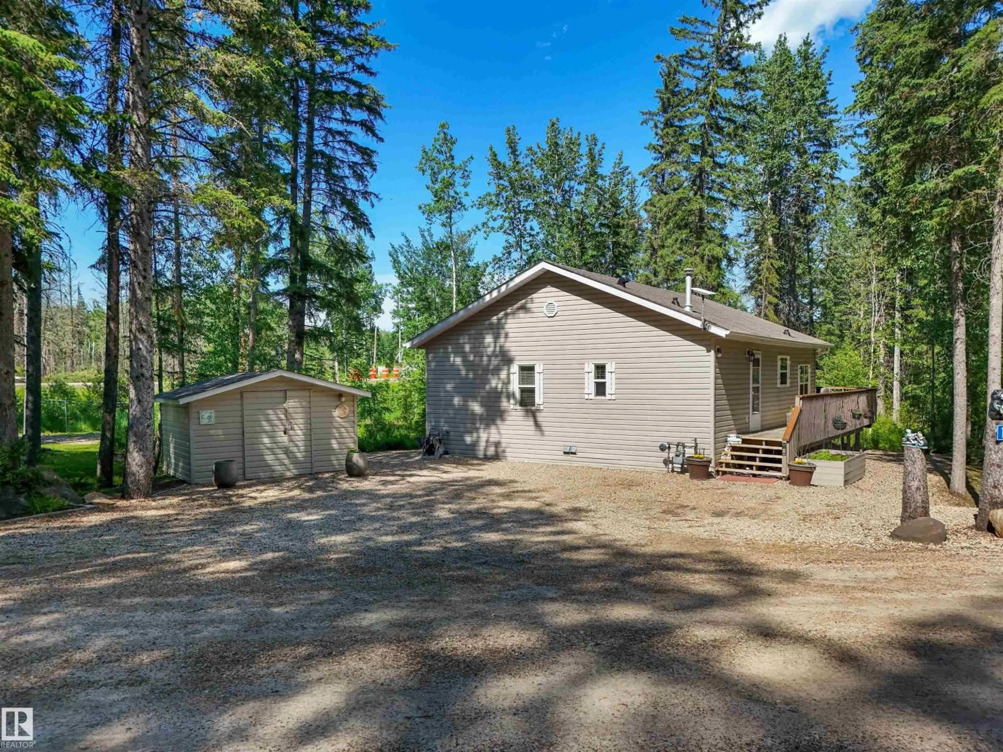 A pic from outside/outdoor area/front of a property/back of a property/a pic from drone, forest/trees view for 157 TWP ROAD 494, Rural Brazeau County Alberta T0C1W0