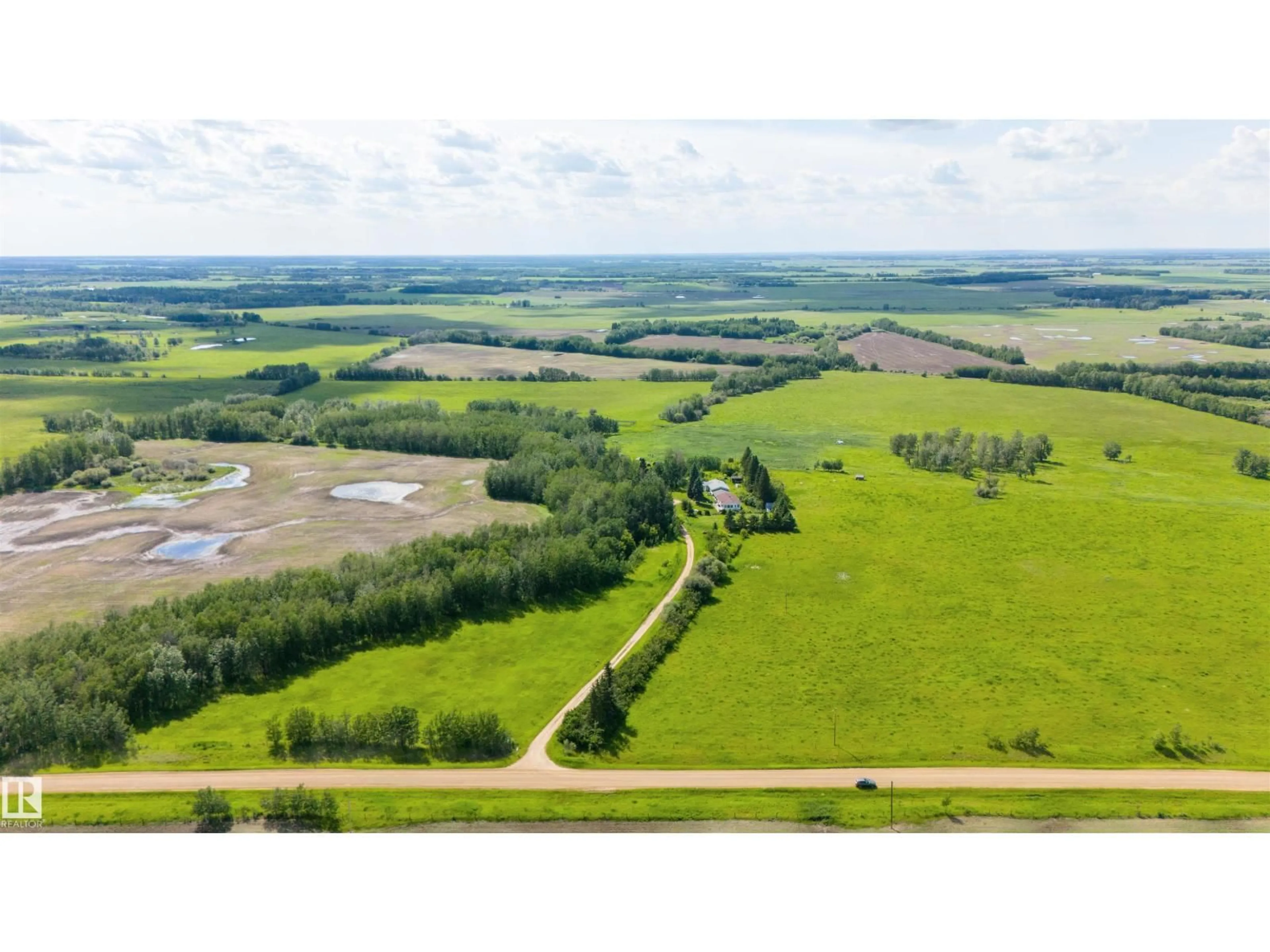 A pic from outside/outdoor area/front of a property/back of a property/a pic from drone, water/lake/river/ocean view for 643016A RGE ROAD 195, Rural Athabasca County Alberta T0A0M0