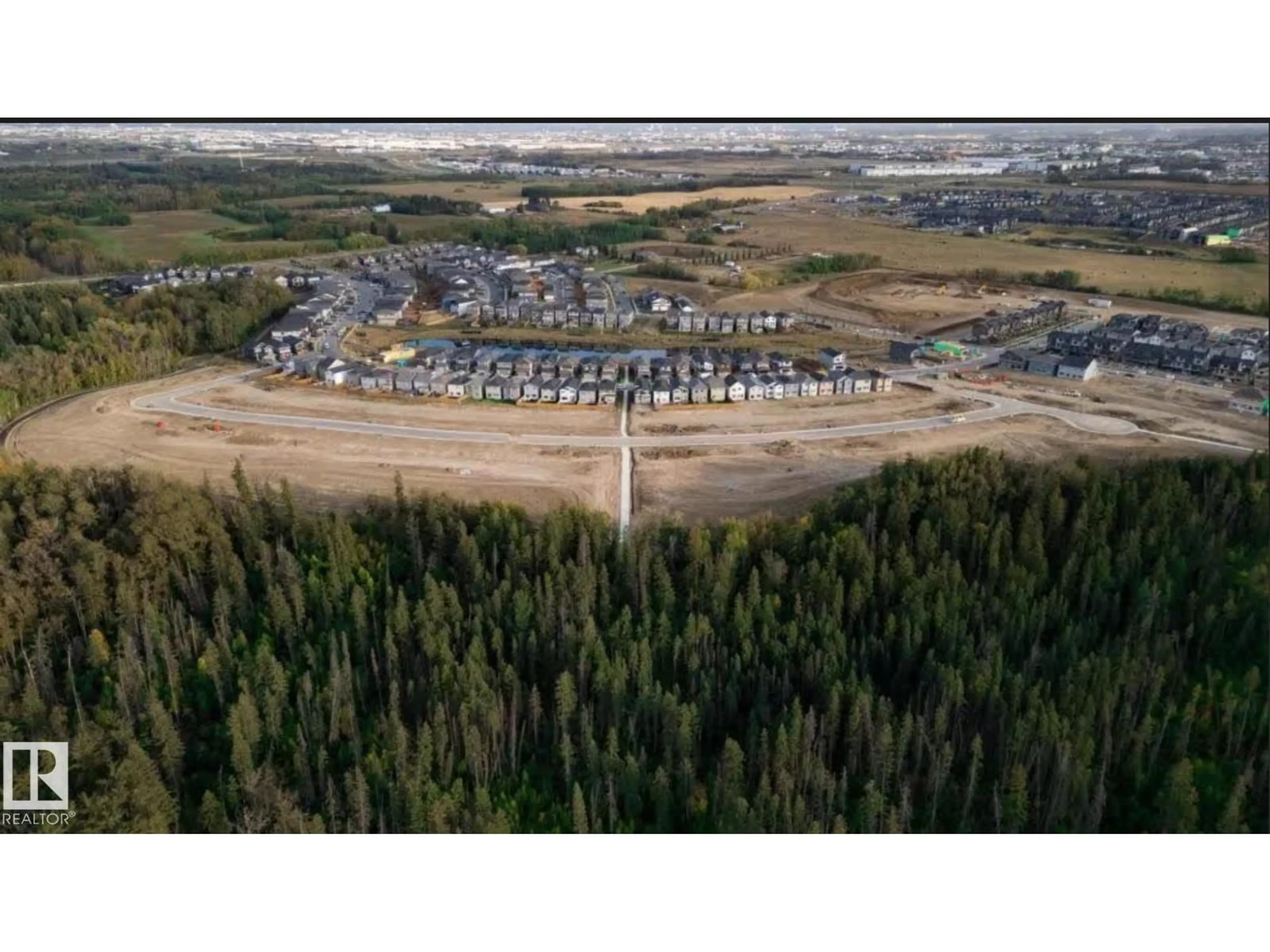 A pic from outside/outdoor area/front of a property/back of a property/a pic from drone, mountain view for 5809 RAVEN CR, Edmonton Alberta T5S0S7