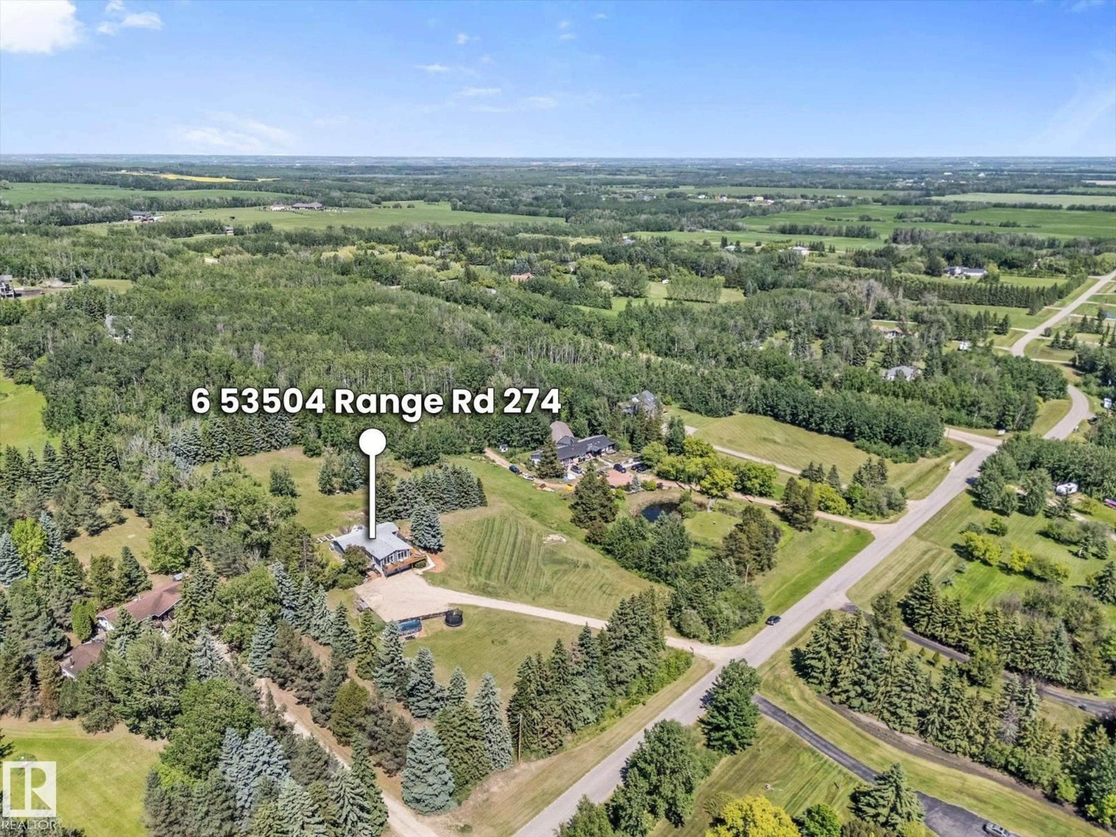 A pic from outside/outdoor area/front of a property/back of a property/a pic from drone, forest/trees view for 53504 - 6 RGE ROAD 274, Rural Parkland County Alberta T7X3T1
