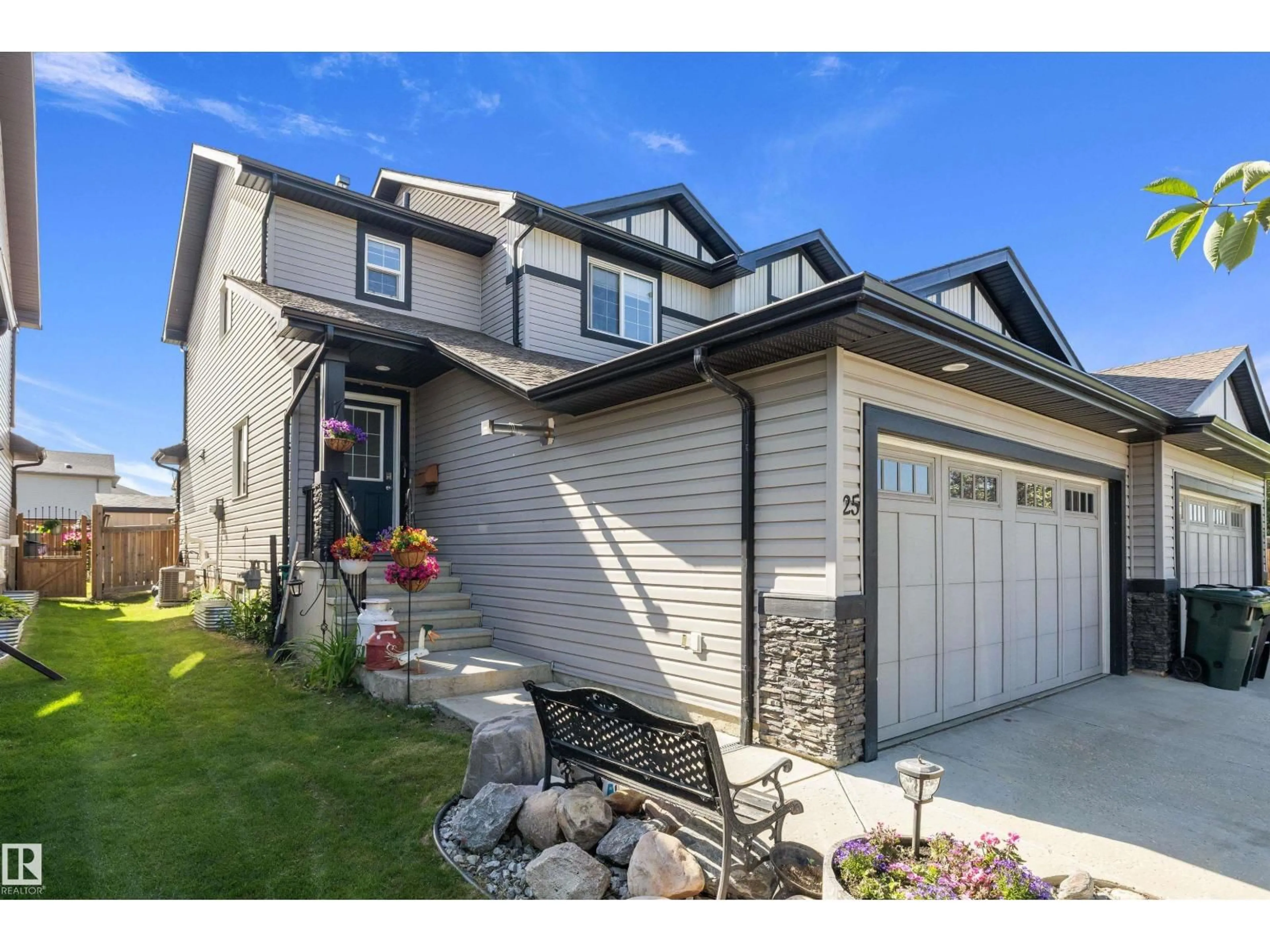 Home with vinyl exterior material, street for 25 HALLADAY BV, Spruce Grove Alberta T7X0E9