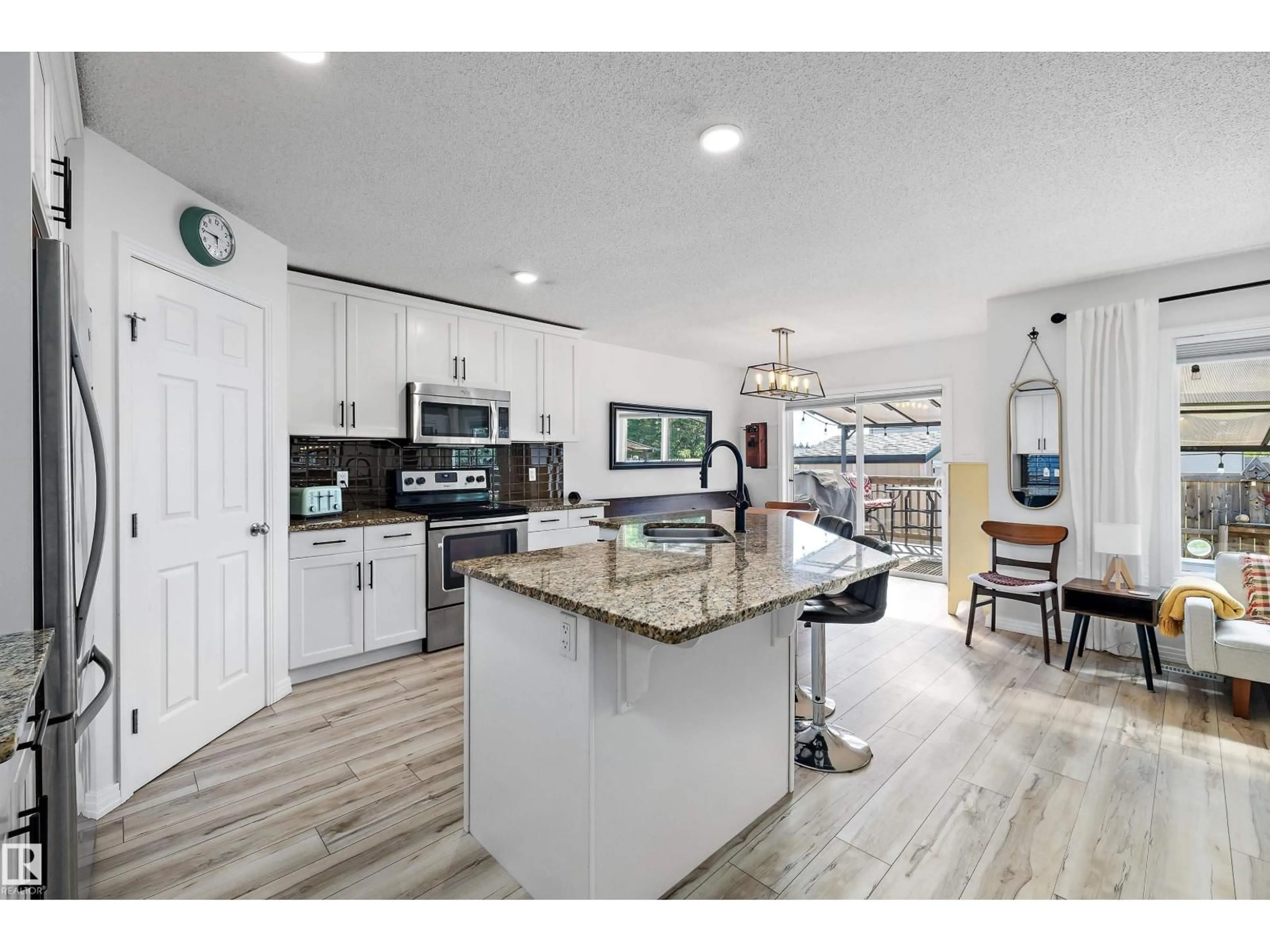 Open concept kitchen, ceramic/tile floor for 25 HALLADAY BV, Spruce Grove Alberta T7X0E9