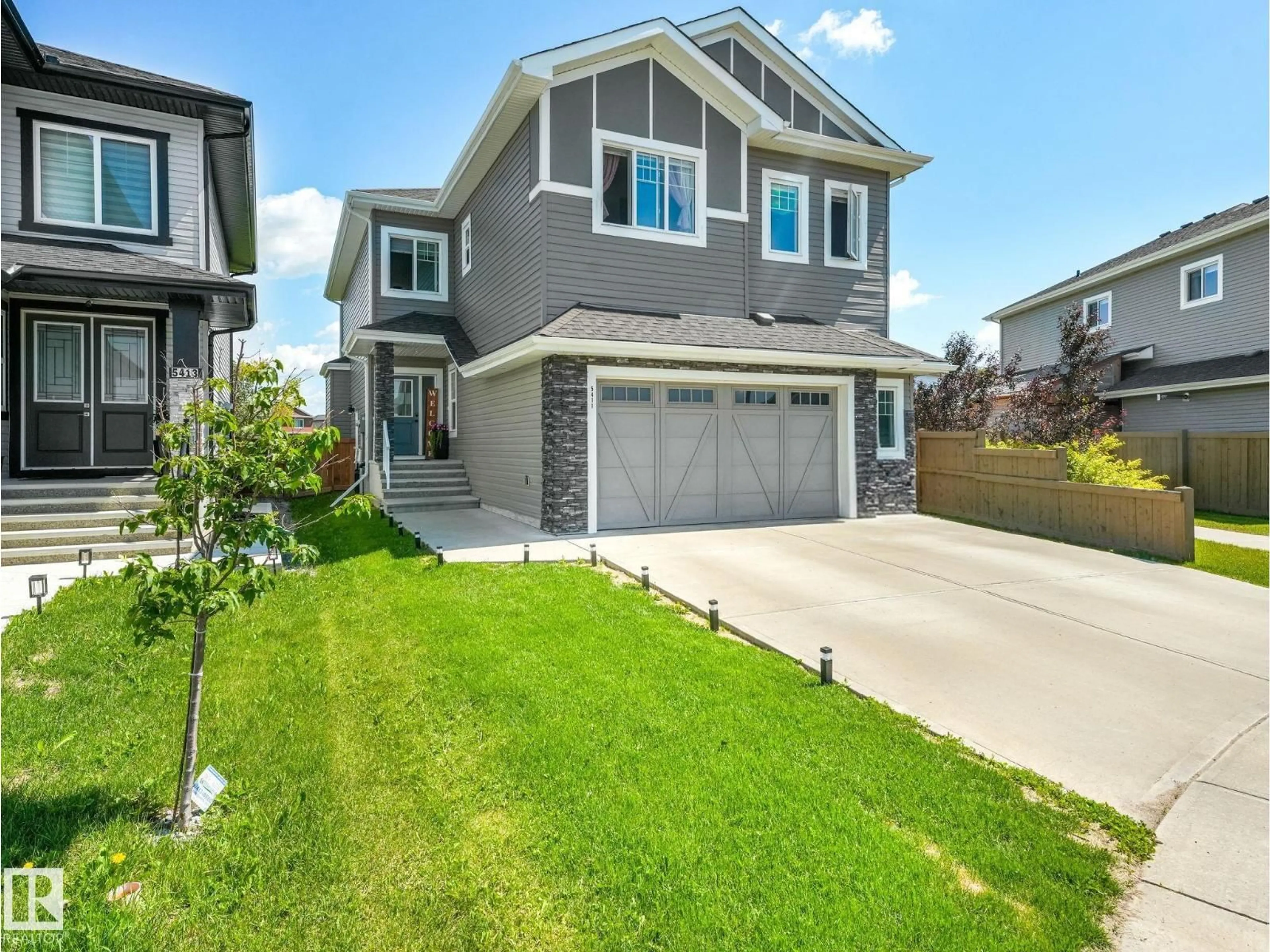 Home with vinyl exterior material, street for 5411 66 ST, Beaumont Alberta T4X2X6