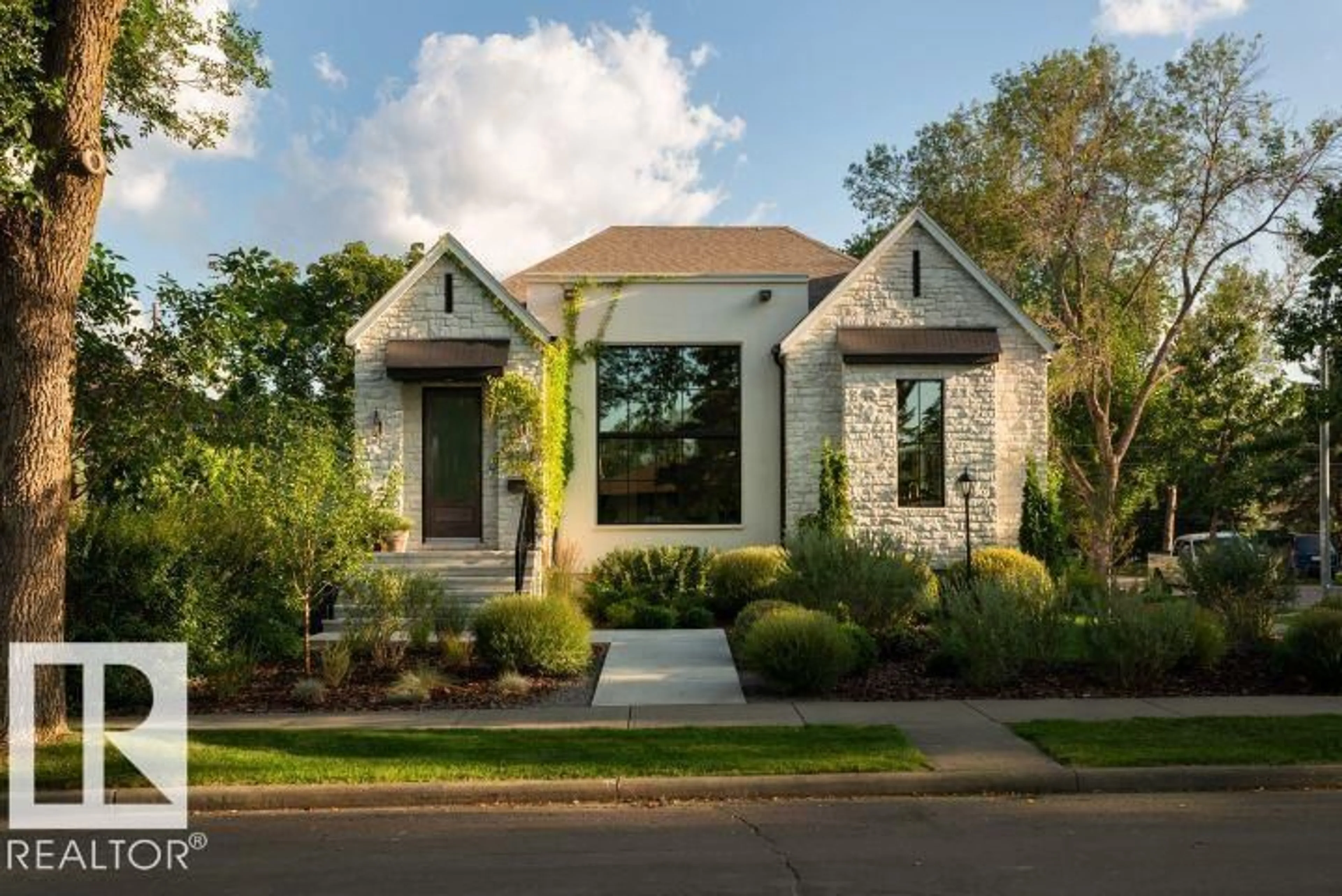Home with brick exterior material, street for NW - 8102 92 AV, Edmonton Alberta T6C1R8