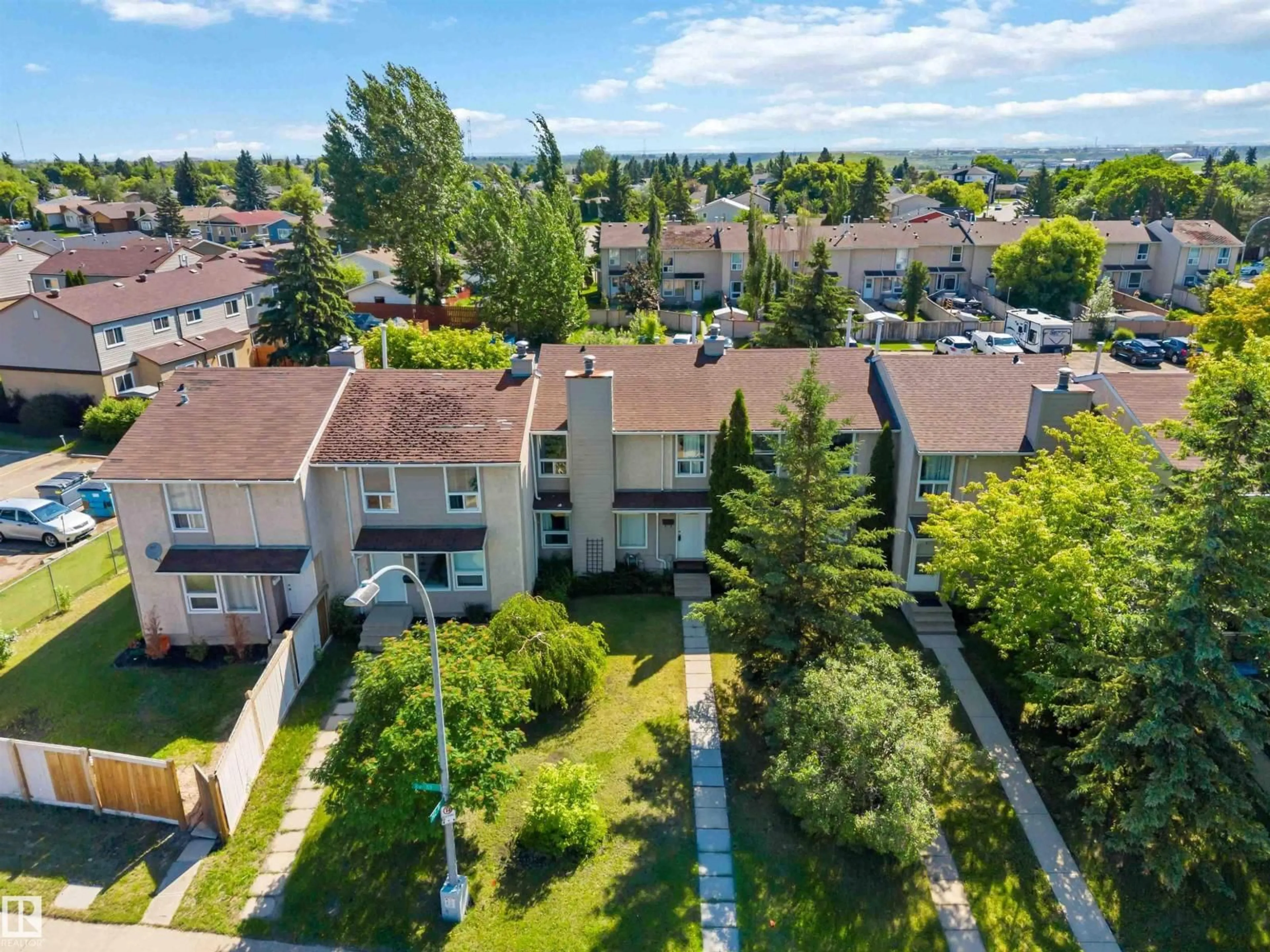A pic from outside/outdoor area/front of a property/back of a property/a pic from drone, unknown for NW - 14121 23 ST, Edmonton Alberta T5Y1P9