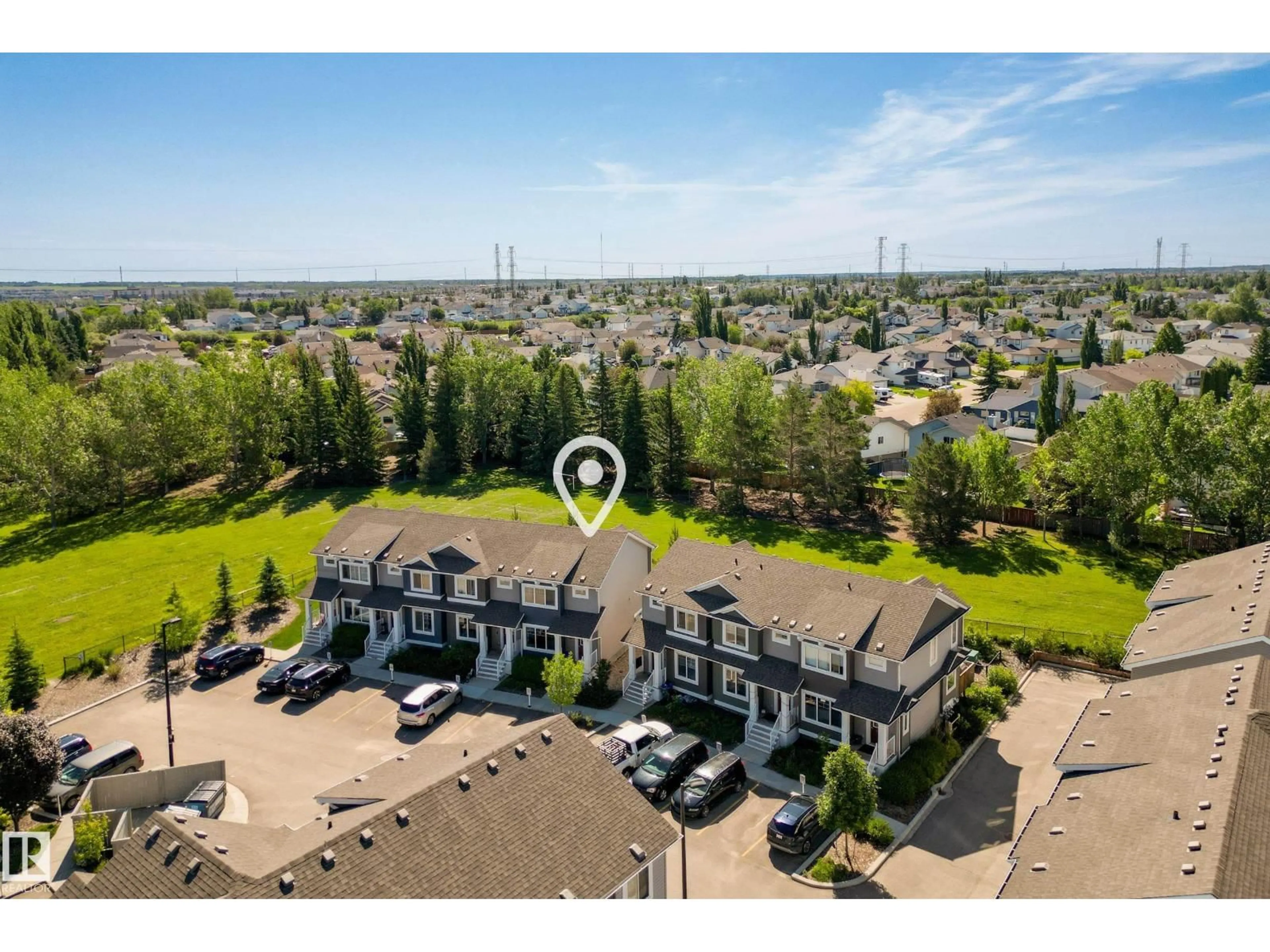 A pic from outside/outdoor area/front of a property/back of a property/a pic from drone, mountain view for #11 - 4205 30 ST, Edmonton Alberta T6T2G9