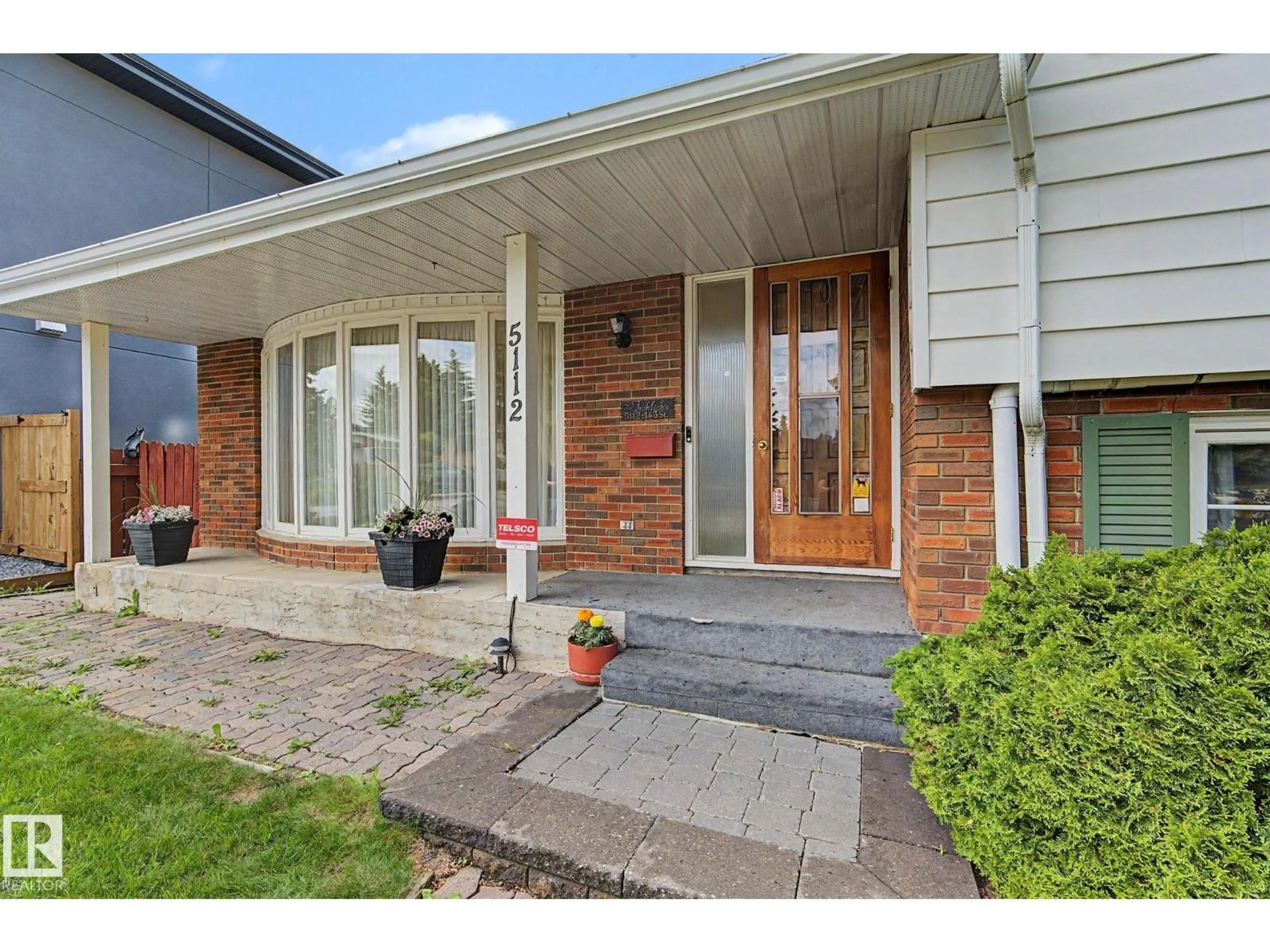Home with brick exterior material, street for 5112 143 ST, Edmonton Alberta T6H4E2
