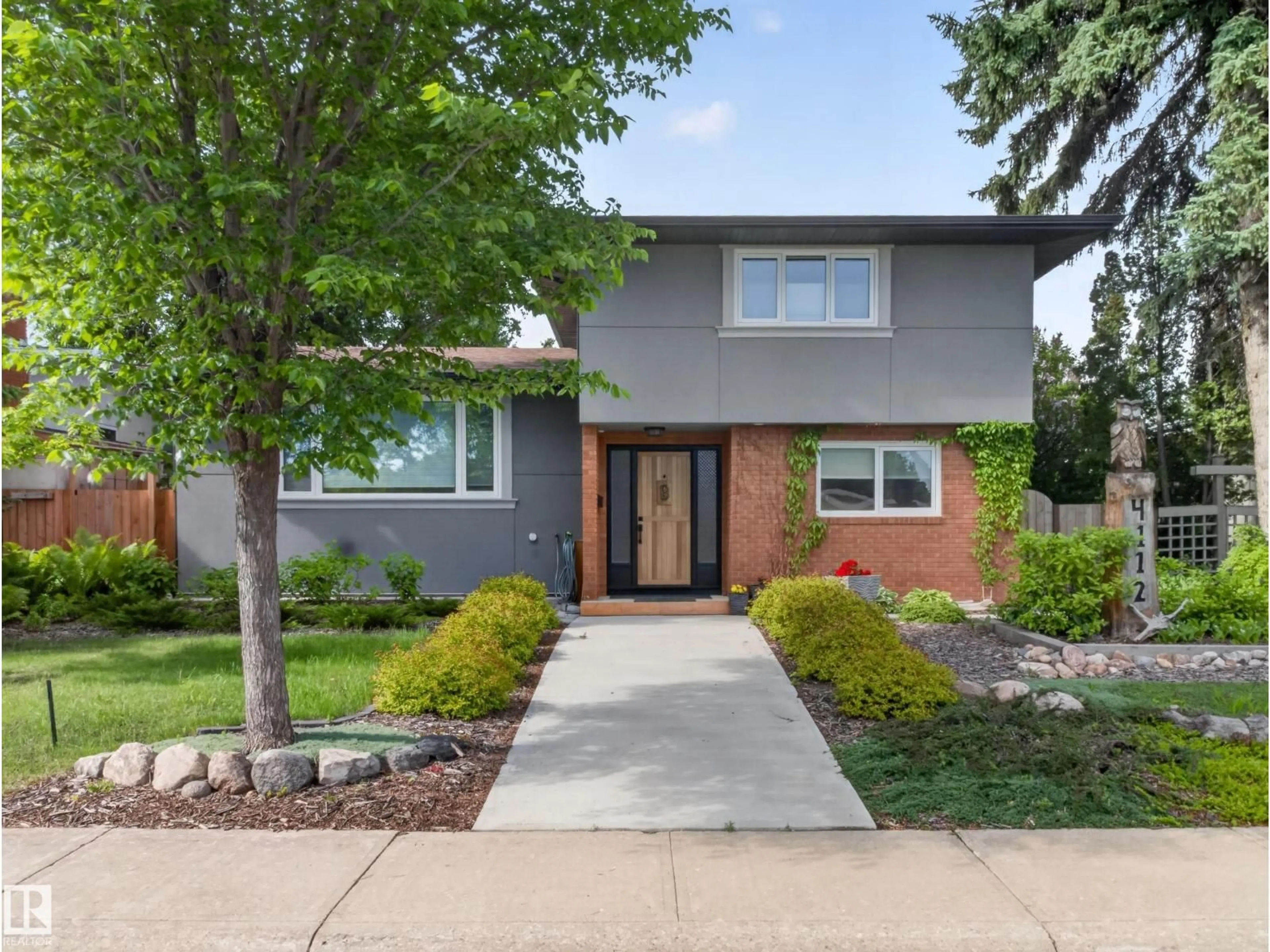 Home with brick exterior material, street for 4112 120 ST, Edmonton Alberta T6J1Y1