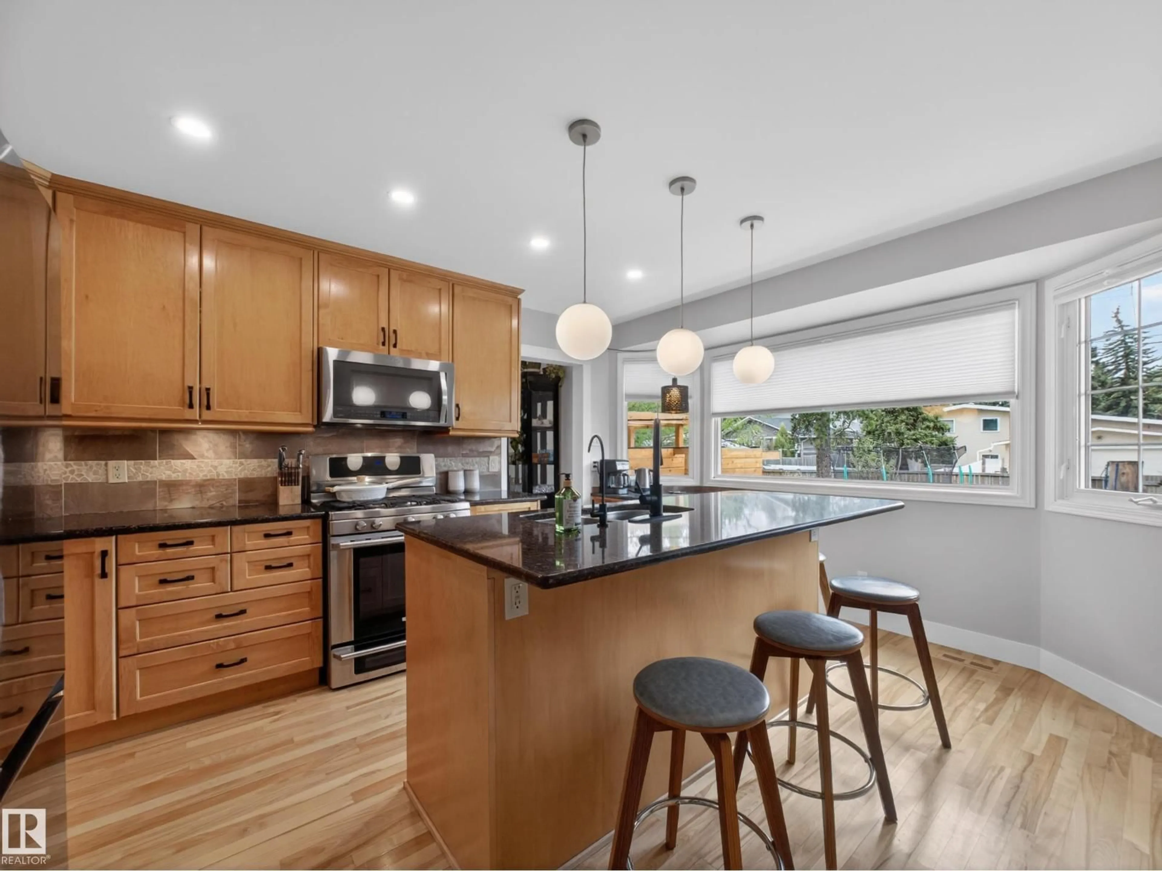 Open concept kitchen, unknown for 4112 120 ST, Edmonton Alberta T6J1Y1