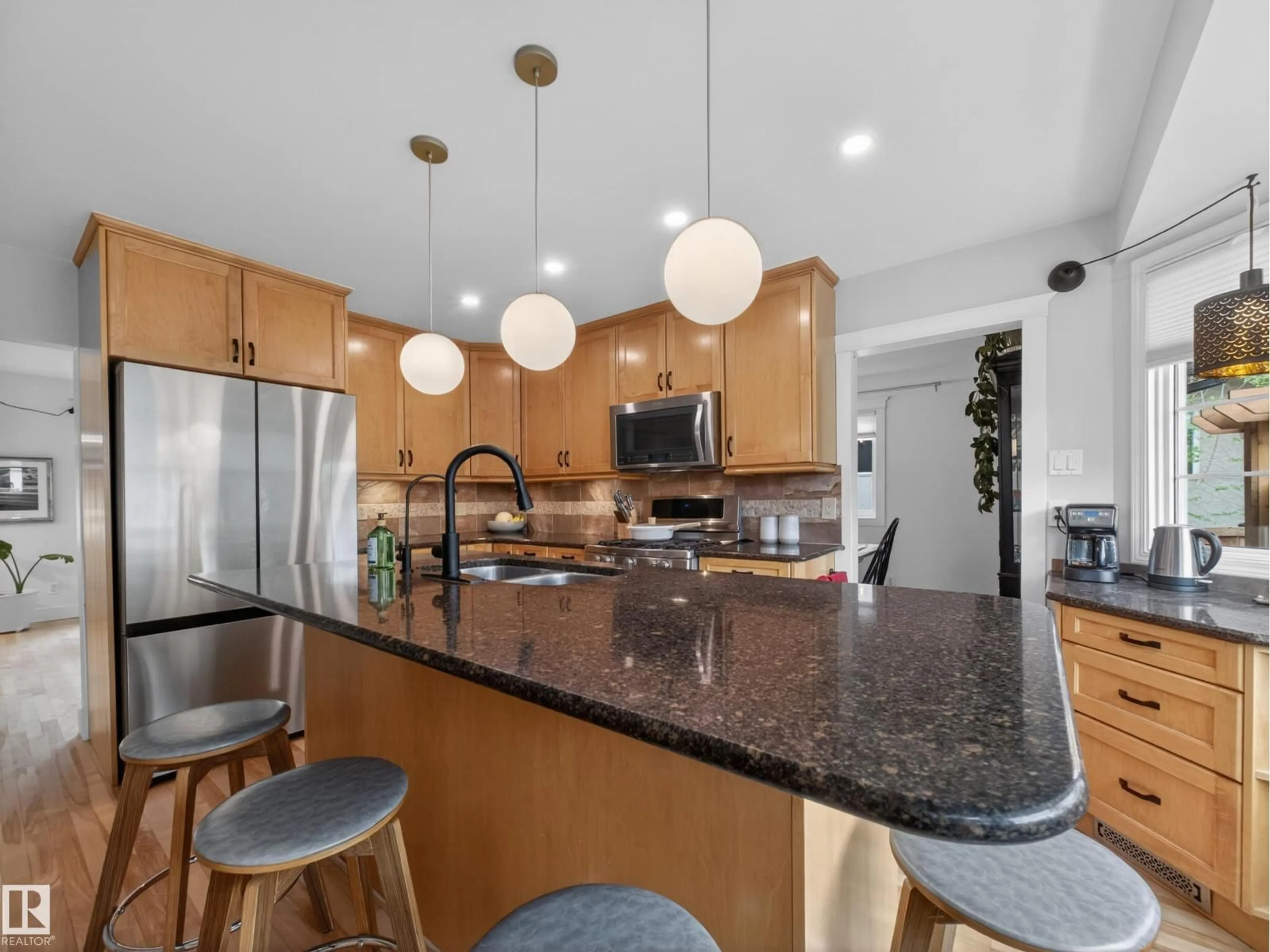 Open concept kitchen, unknown for 4112 120 ST, Edmonton Alberta T6J1Y1