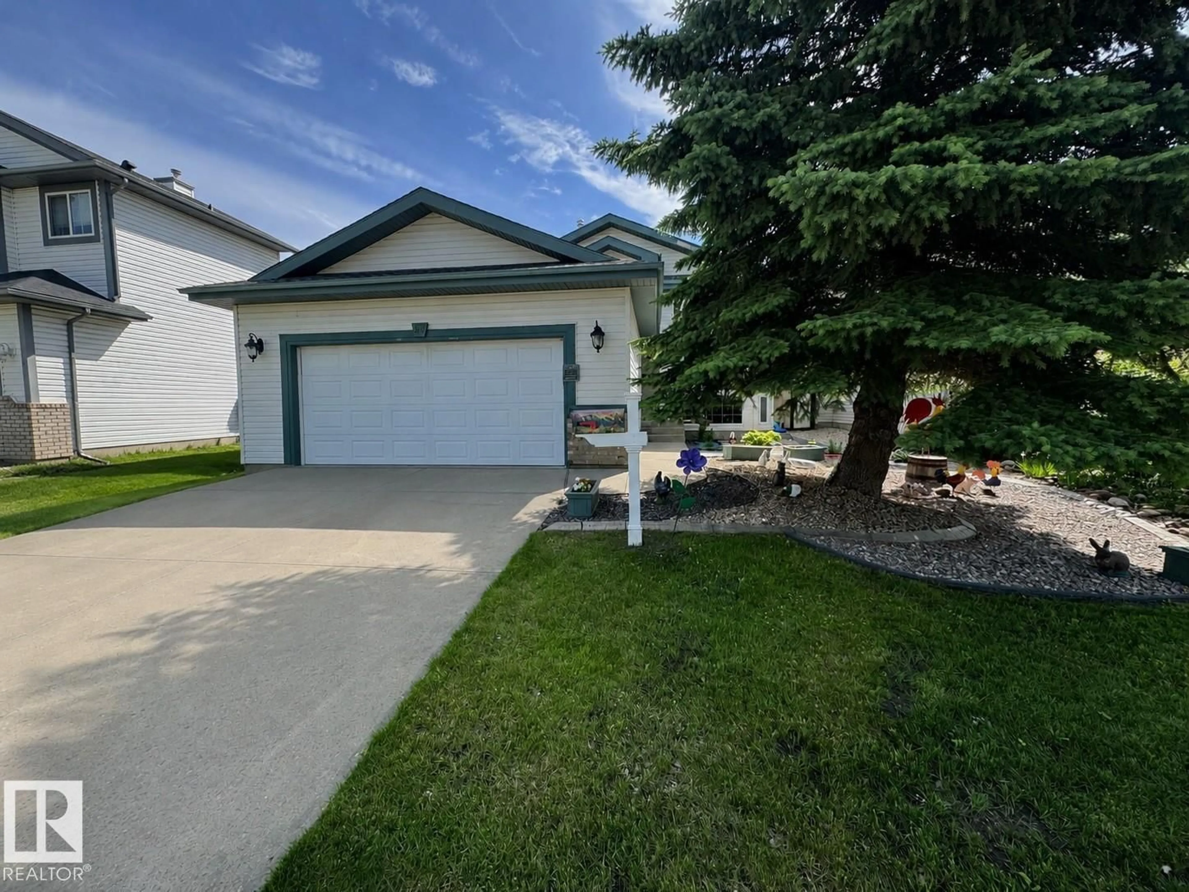 A pic from outside/outdoor area/front of a property/back of a property/a pic from drone, street for 46 CLARKDALE DR, Sherwood Park Alberta T8H2E2
