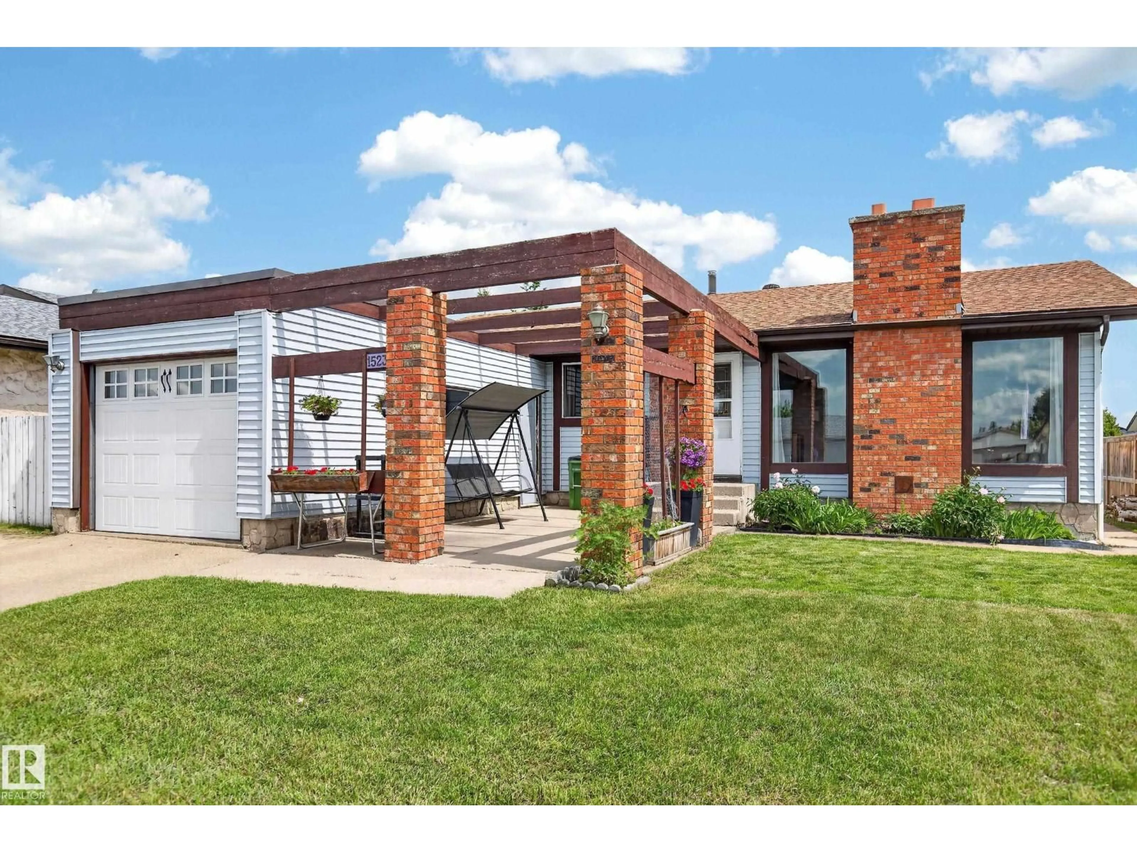 Home with brick exterior material, unknown for 15231 117 ST, Edmonton Alberta T5X1R2