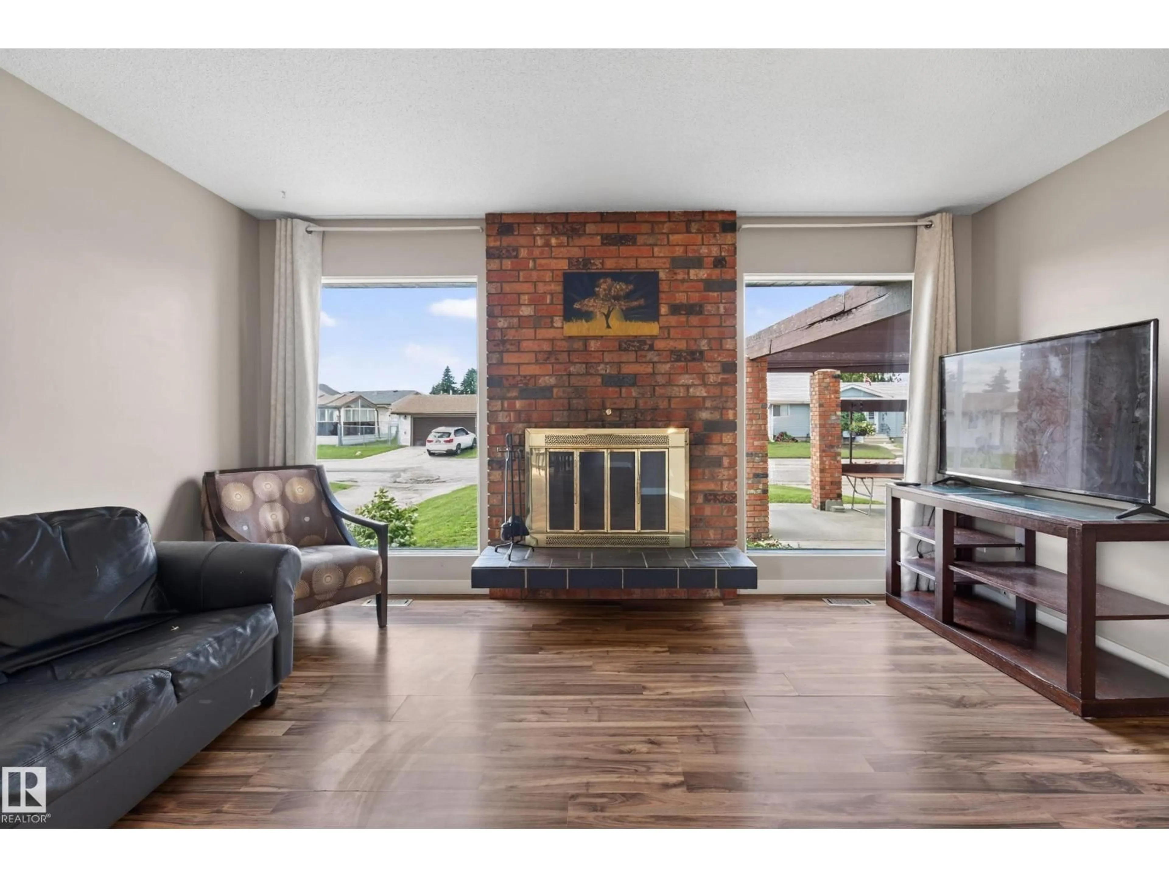 Living room with furniture, unknown for 15231 117 ST, Edmonton Alberta T5X1R2