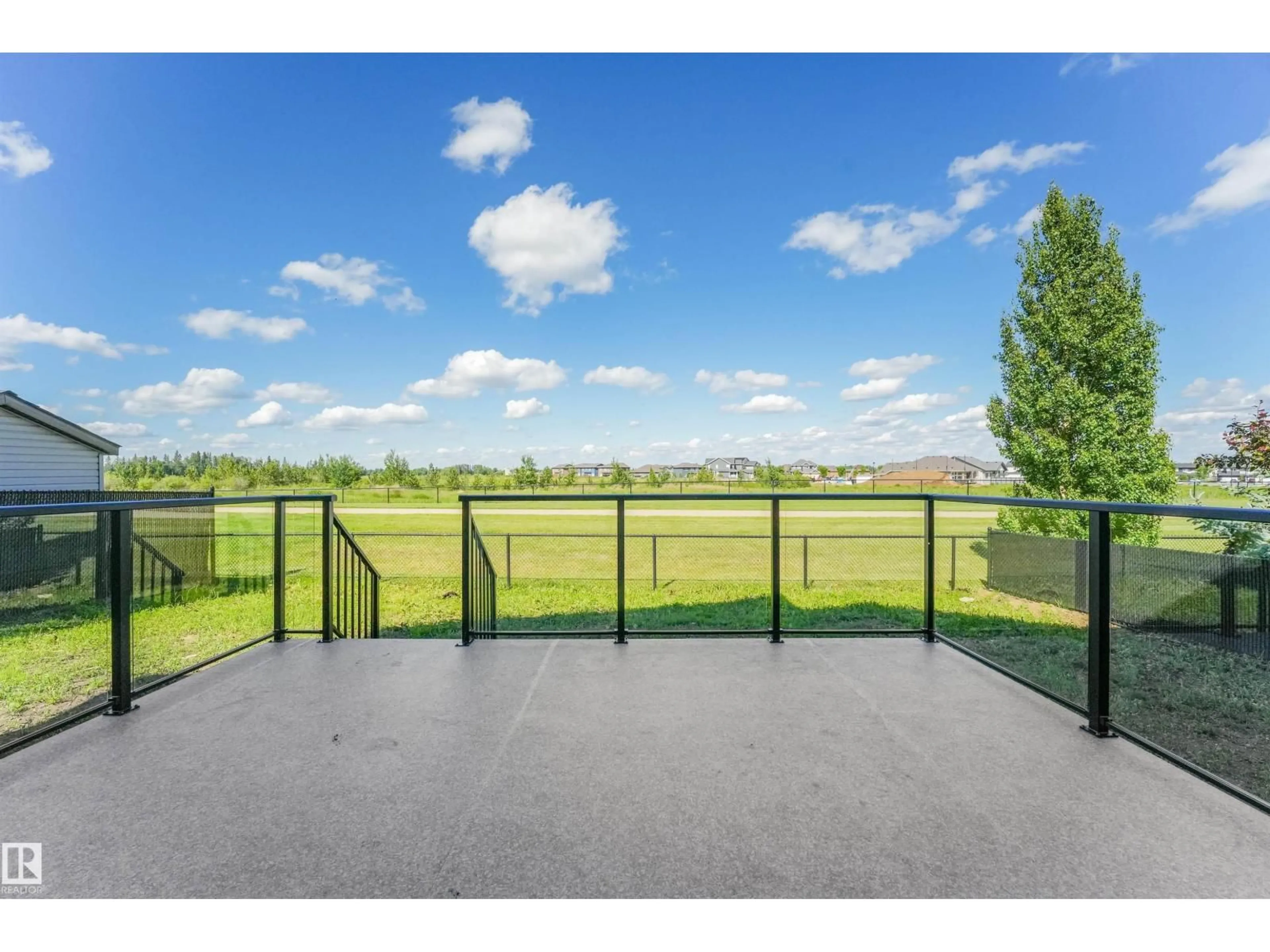 A pic from outside/outdoor area/front of a property/back of a property/a pic from drone, water/lake/river/ocean view for 1180 GENESIS LAKE BOULEVARD, Stony Plain Alberta T7Z0G3