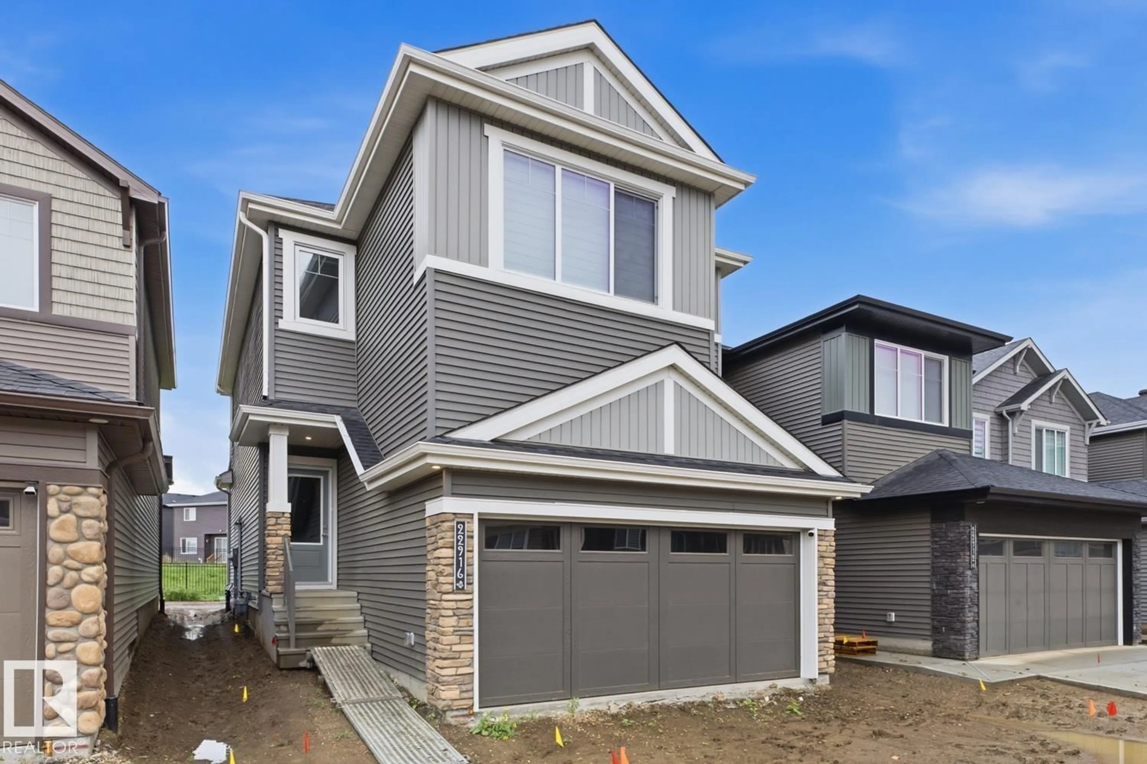 Home with vinyl exterior material, street for 22916 82 AVE NW, Edmonton Alberta T5T4N5